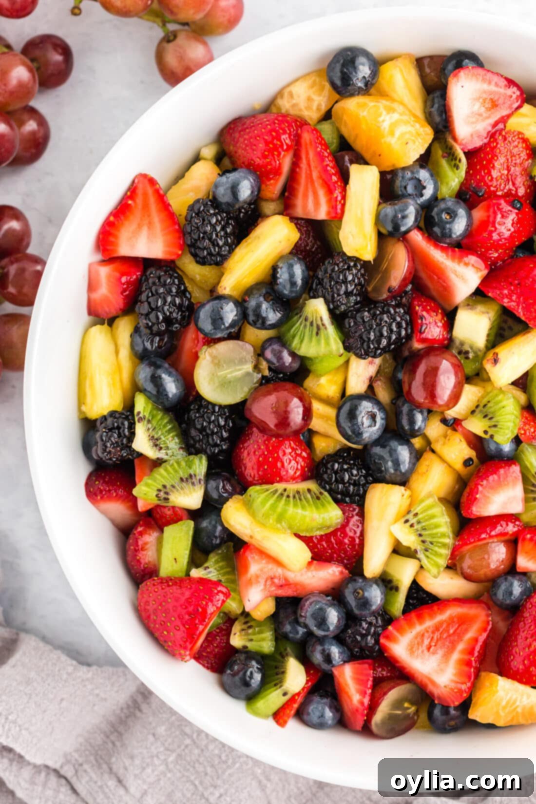 Close-up view of a bountiful fruit salad, showcasing vibrant colors and fresh ingredients