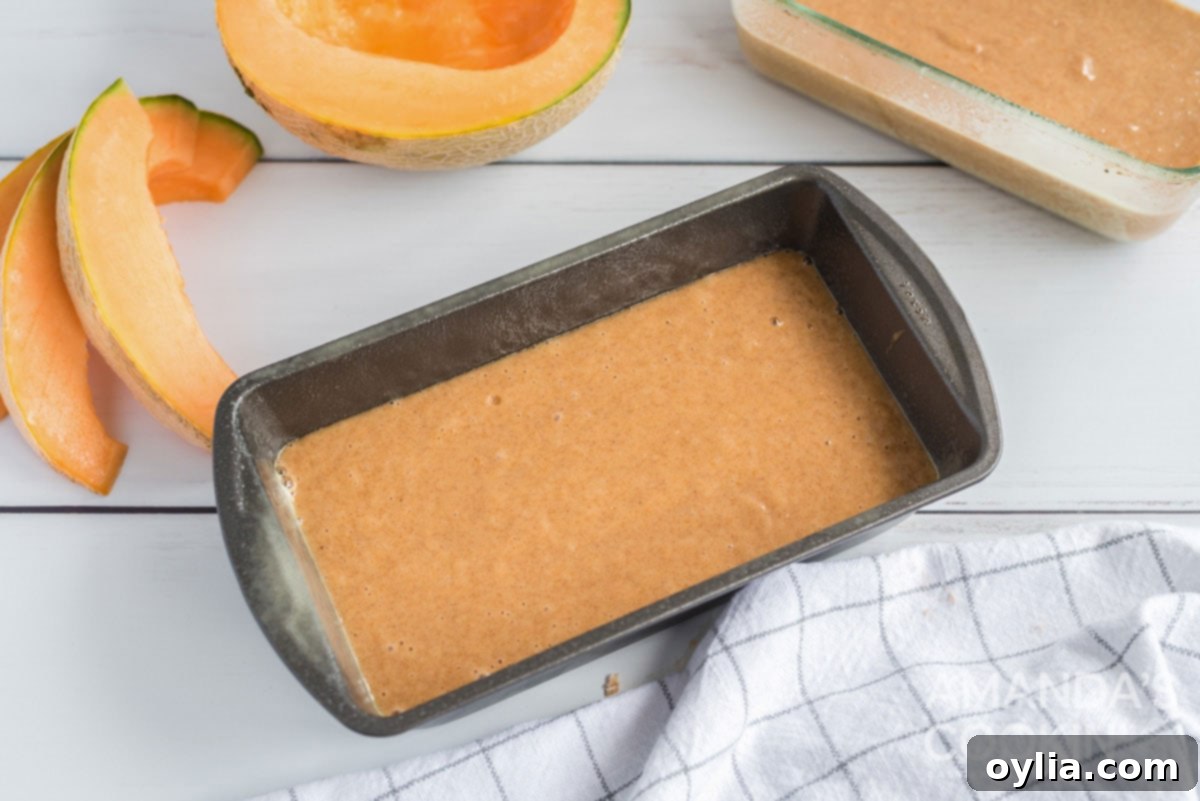 Raw quick bread batter poured into a loaf pan, ready for baking.