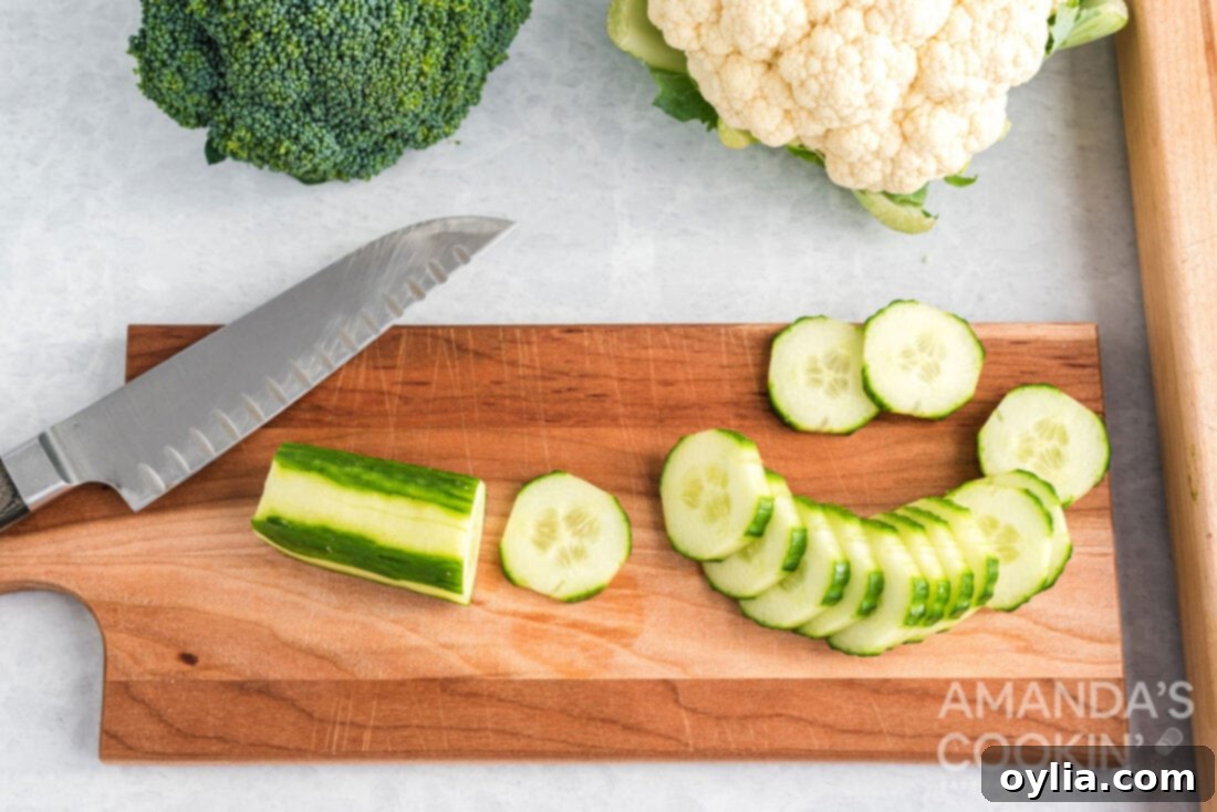 sliced cucumber on a cutting board