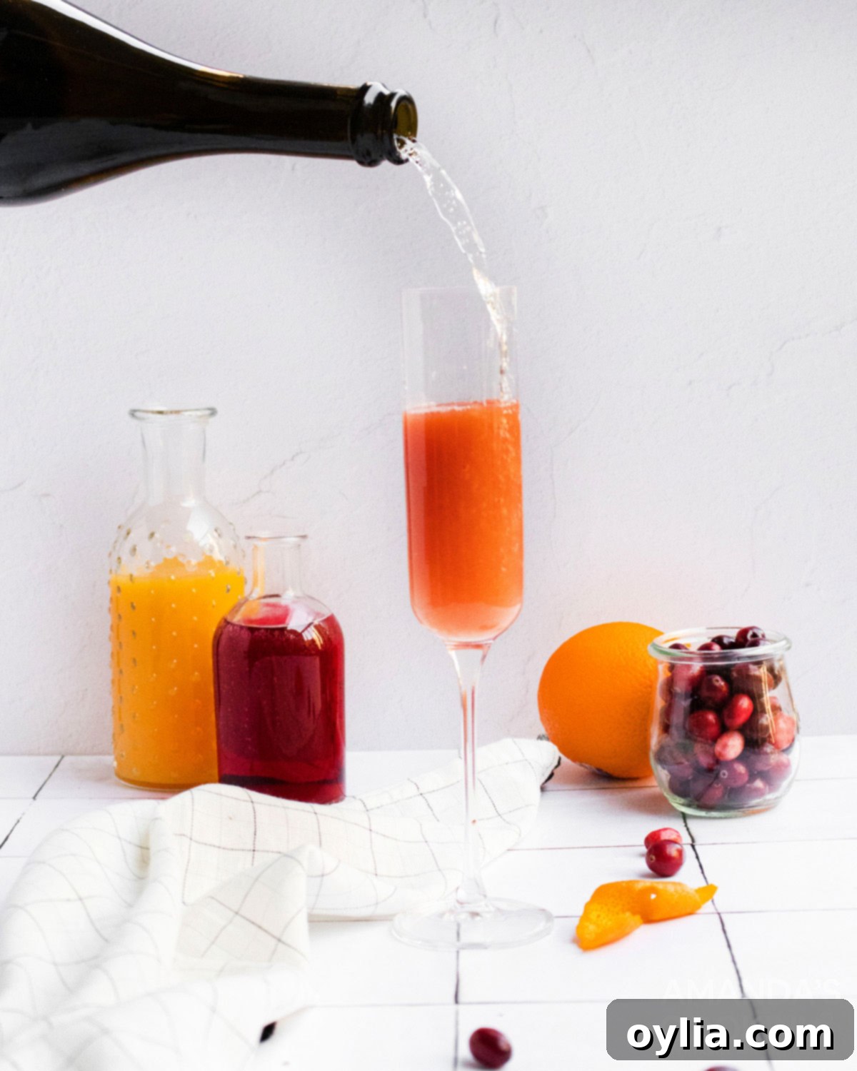 pouring sparkling wine into a chamagne flute