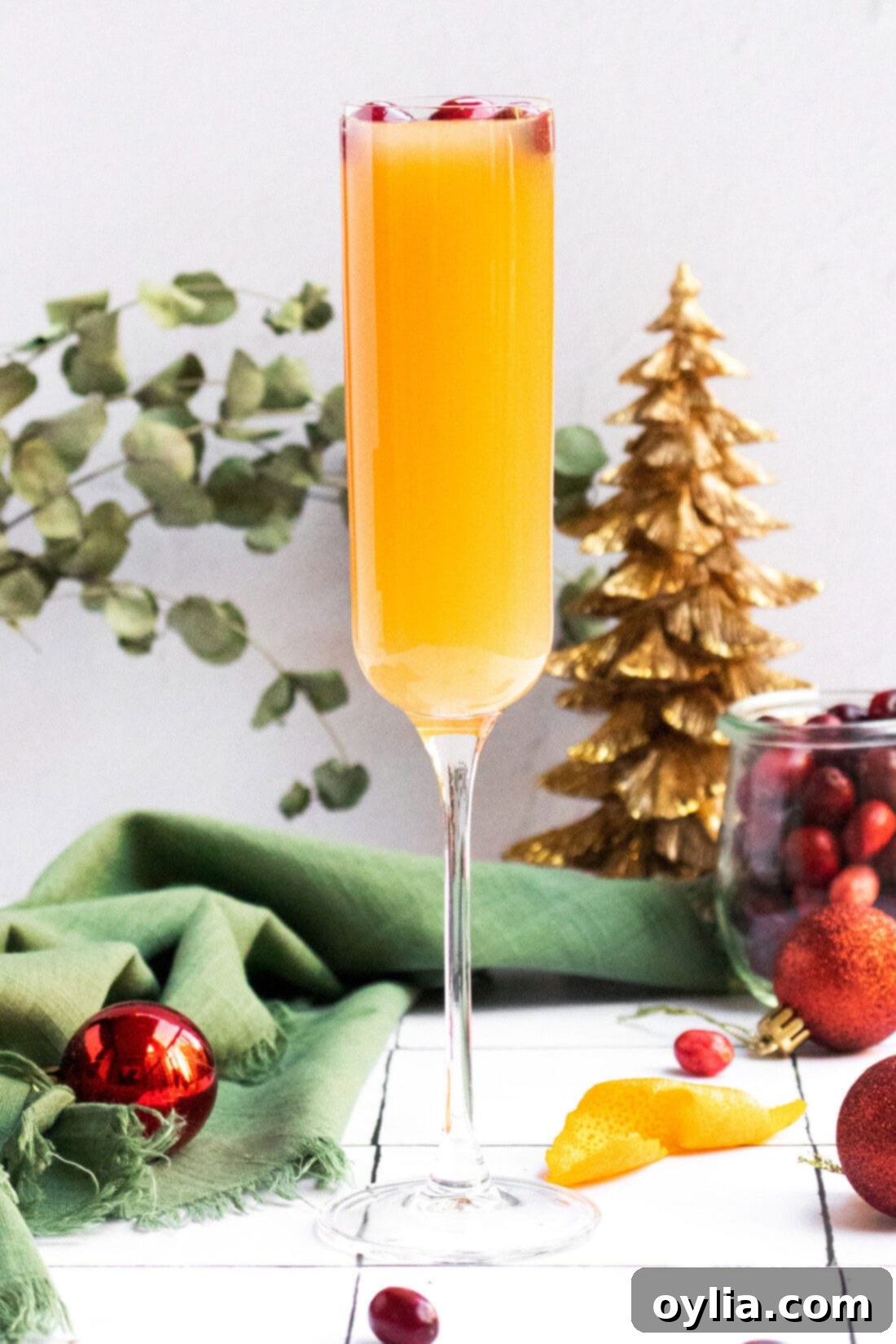 cranberry mimosa in a champagne flute