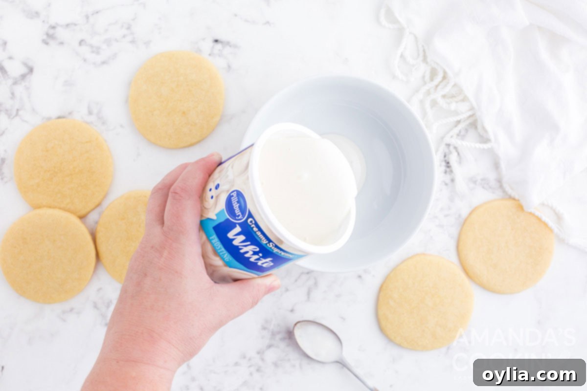 pouring frosting in bowl