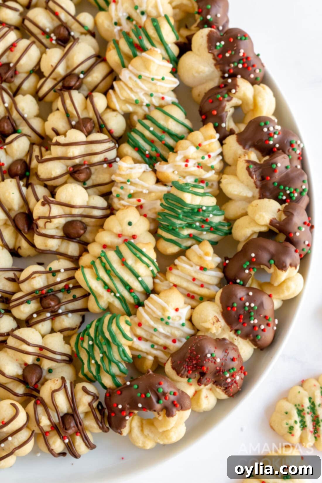 plate of decorated spritz cookies, ready for holiday serving