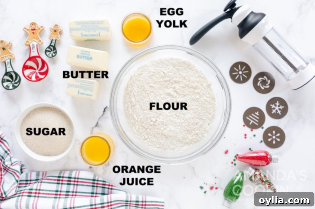 labeled ingredients for spritz cookies: flour, butter, sugar, orange juice, egg yolk