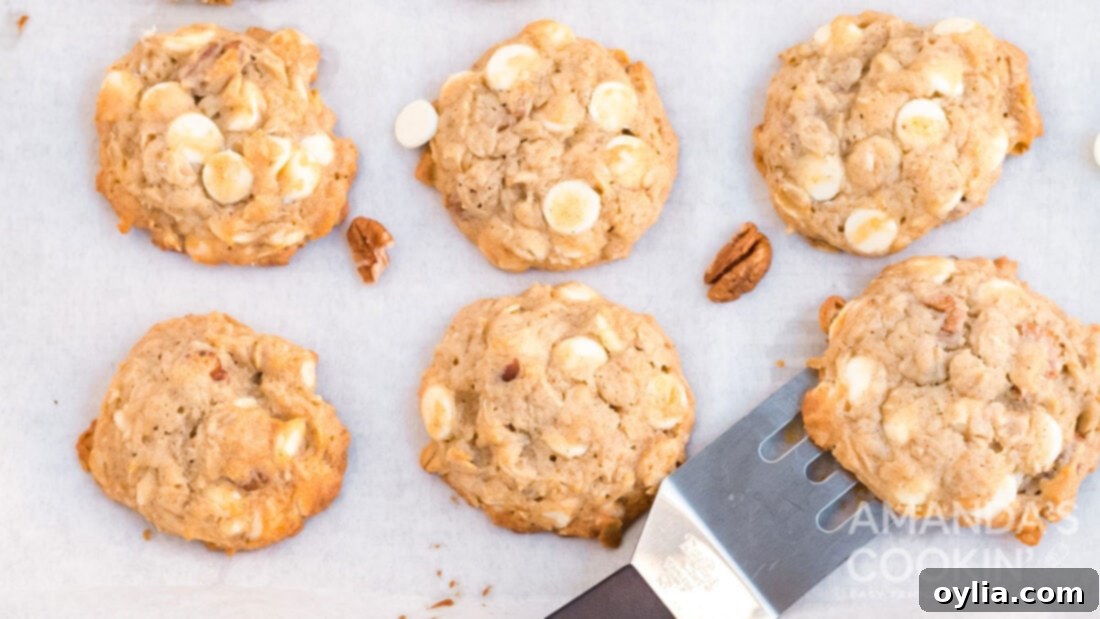 Banana Bliss Bites 13 Two banana cookies with a spatula, ready to be served