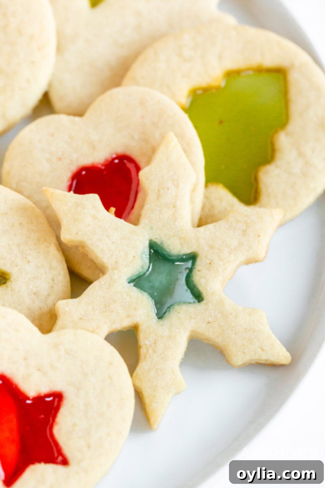 snowflake shaped stained glass cookie