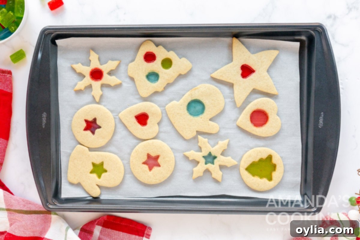 stained glass cookies on a baking sheet