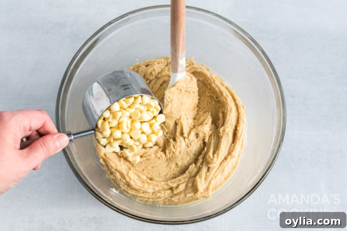 Adding white chocolate chips to the cookie dough