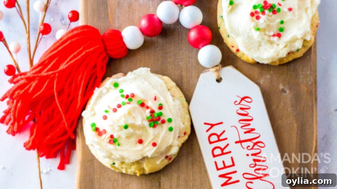 Frosted cake mix cookies with red and green Christmas sprinkles on a wooden cutting board