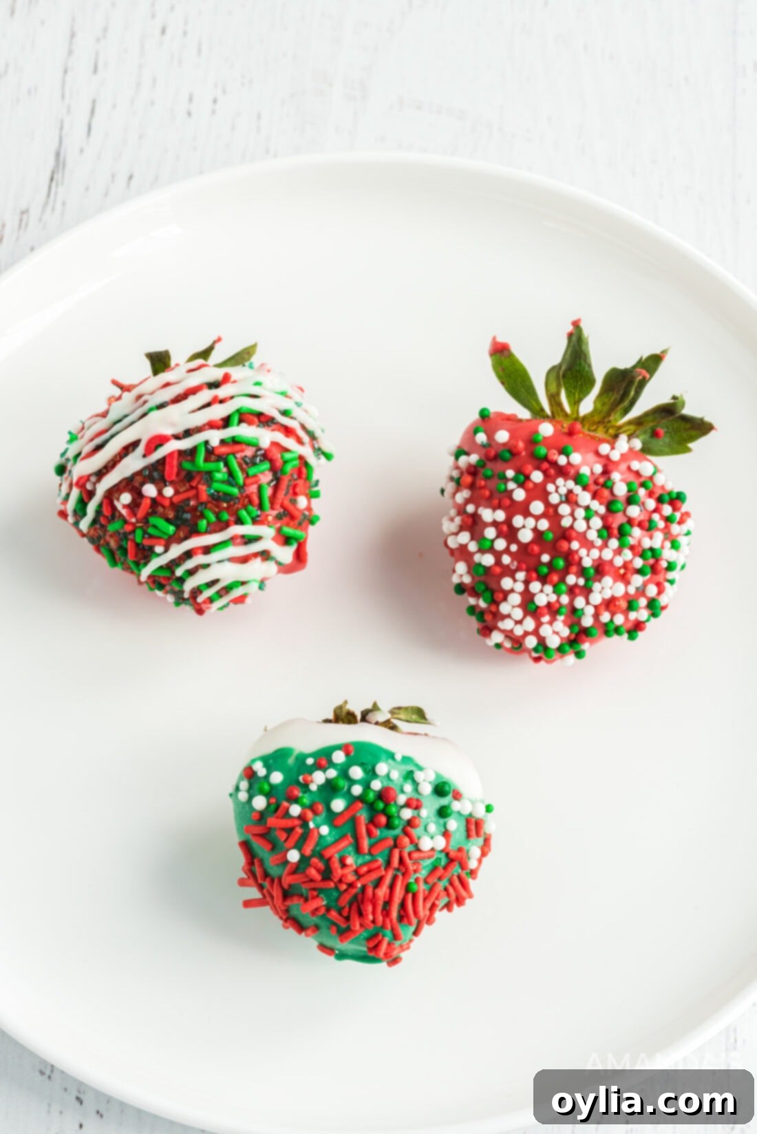 Holiday Chocolate Strawberry Bliss 2 chocolate covered strawberries with christmas colored chocolate and sprinkles