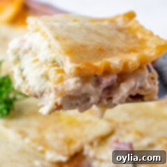 Creamy Chicken Cordon Bleu Lasagna 12 Chicken Cordon Bleu Lasagna with a slice removed