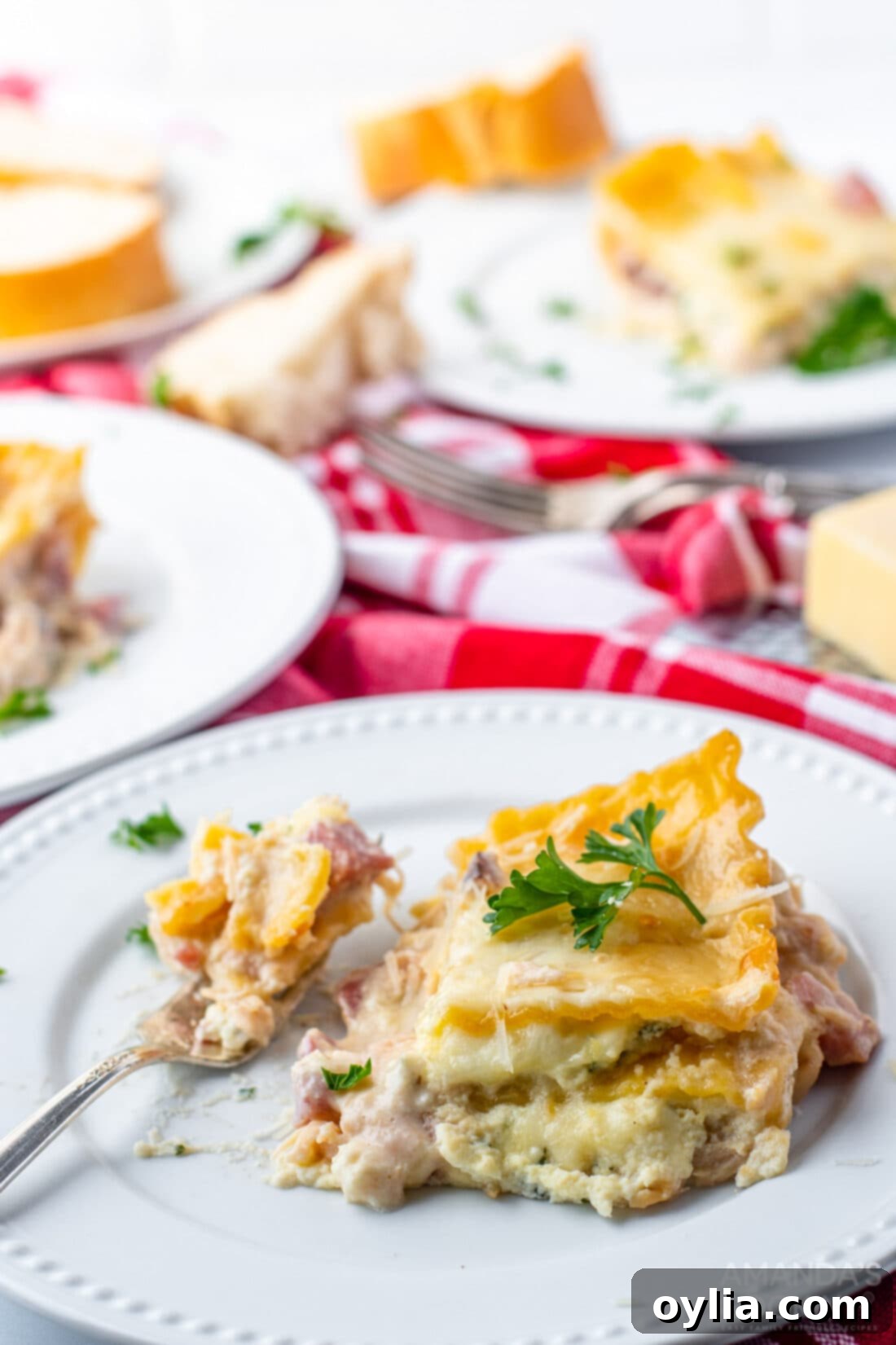 Creamy Chicken Cordon Bleu Lasagna 3 A perfect slice of Chicken Cordon Bleu Lasagna served on a white plate, ready to be enjoyed.