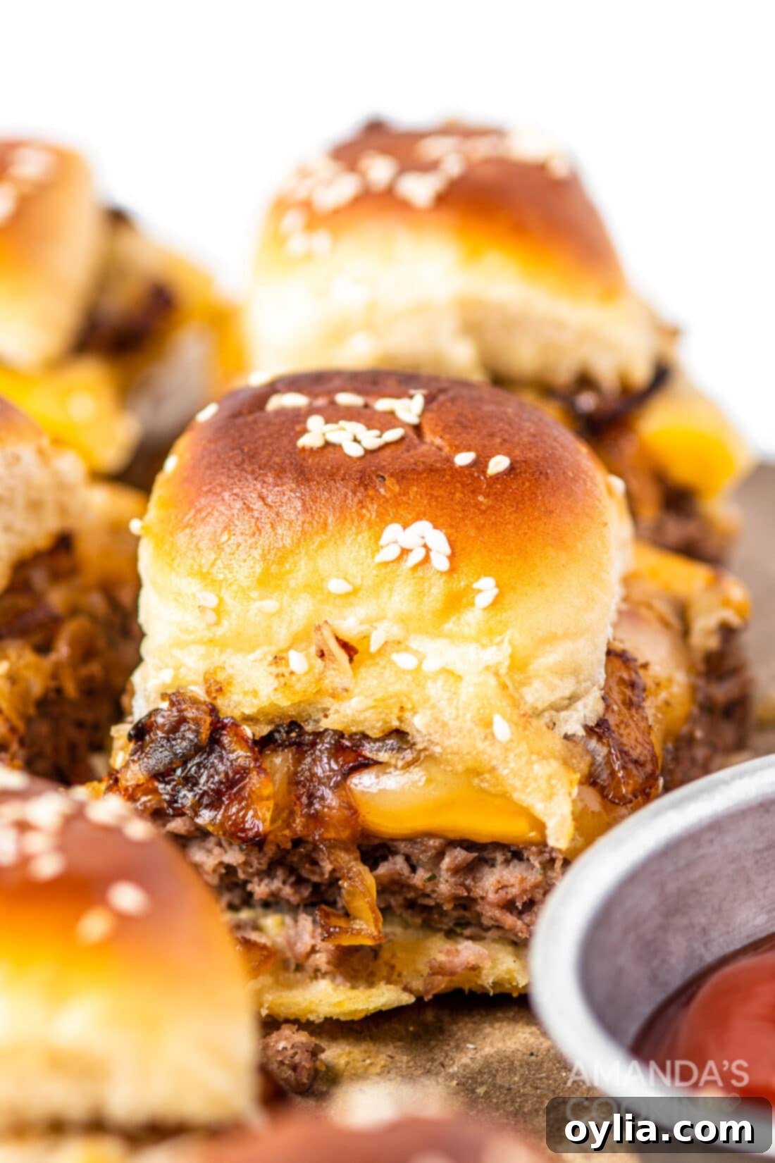 Cheeseburger sliders served on a tray, ready to eat