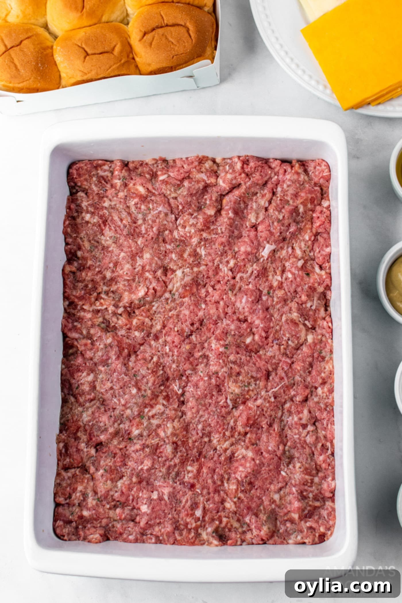 Step 1: Pressing meat mixture into baking pan