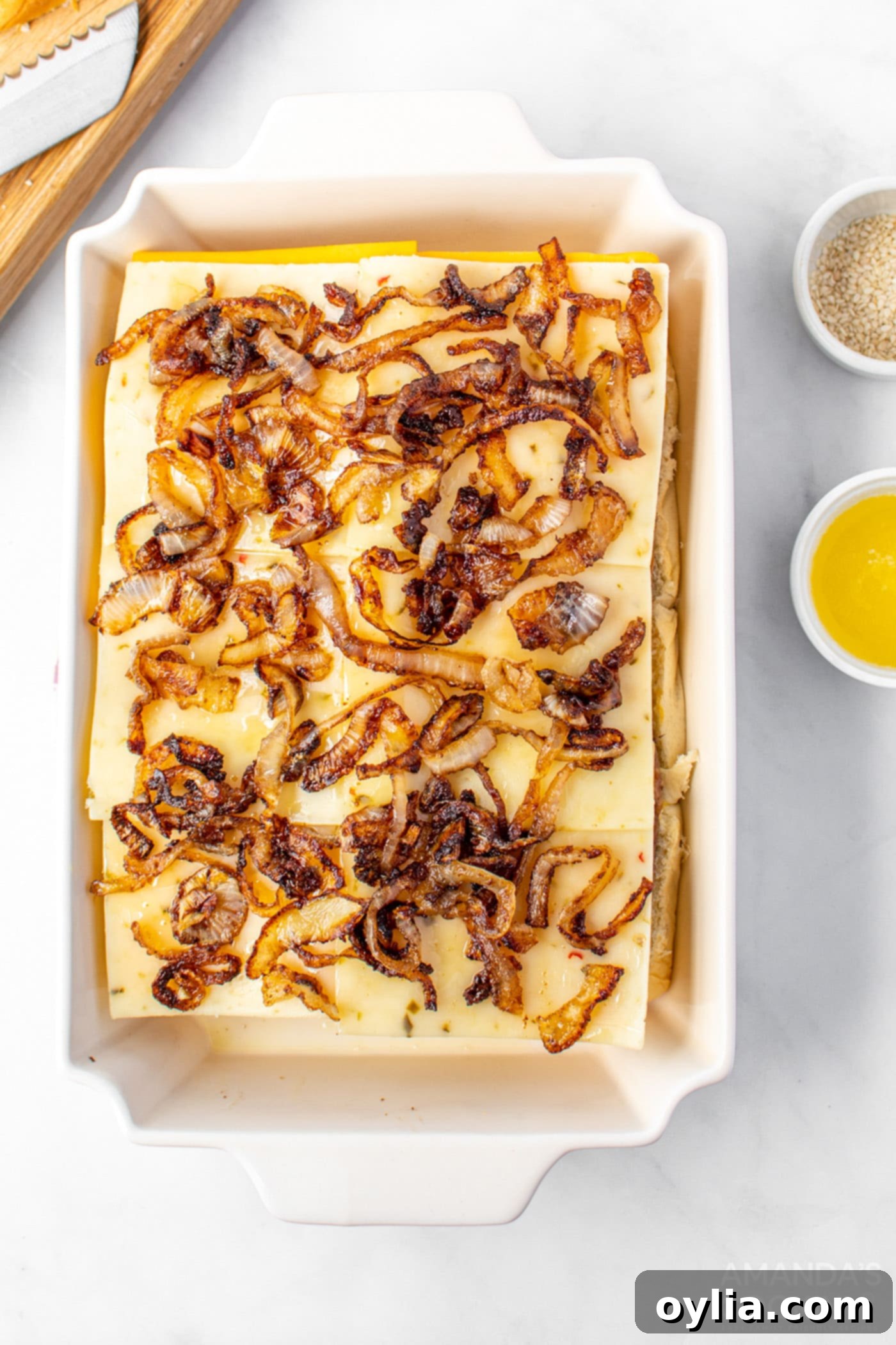 Step 5: Spreading caramelized onions over cheese