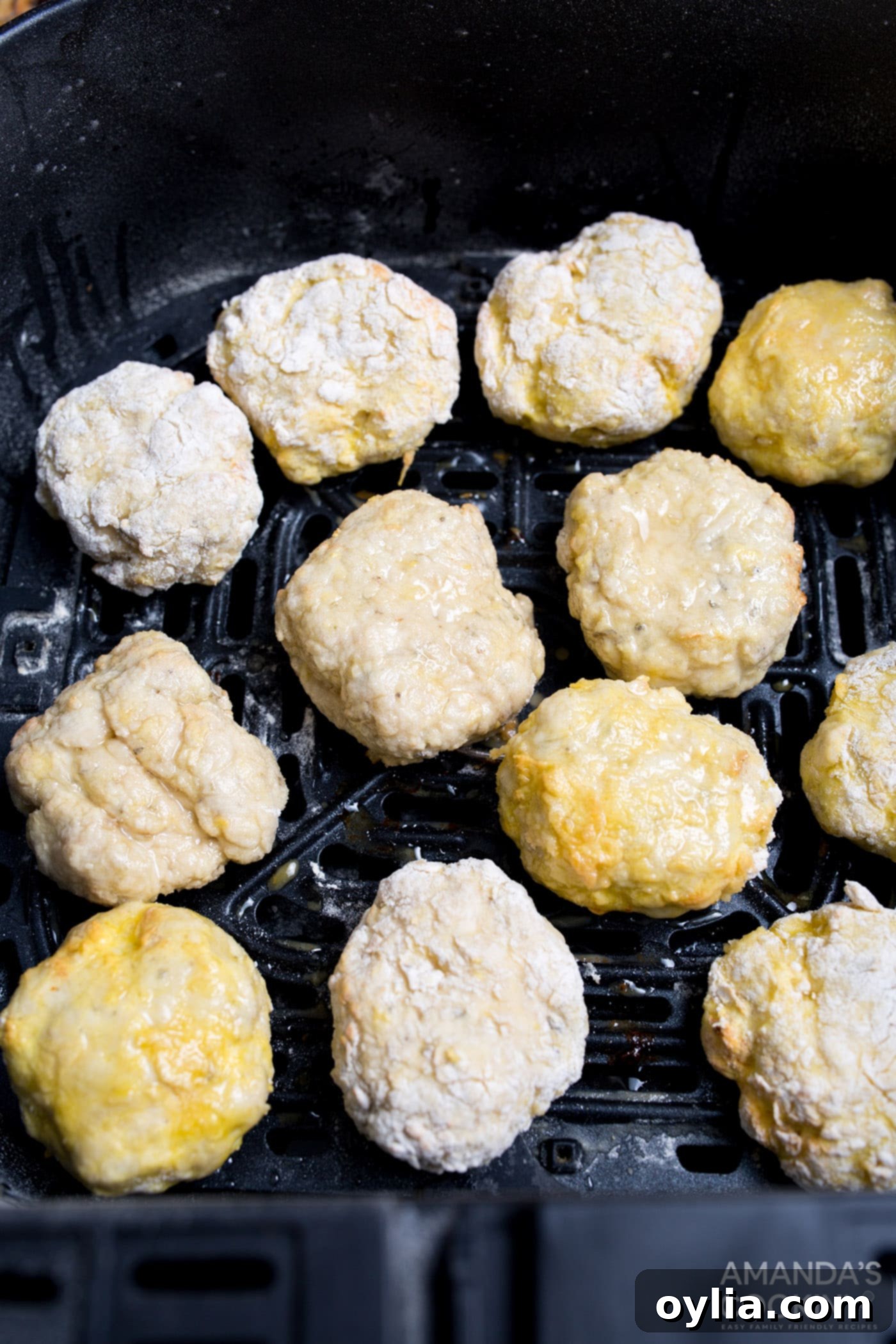 uncooked air fryer chicken nuggets in air fryer basket