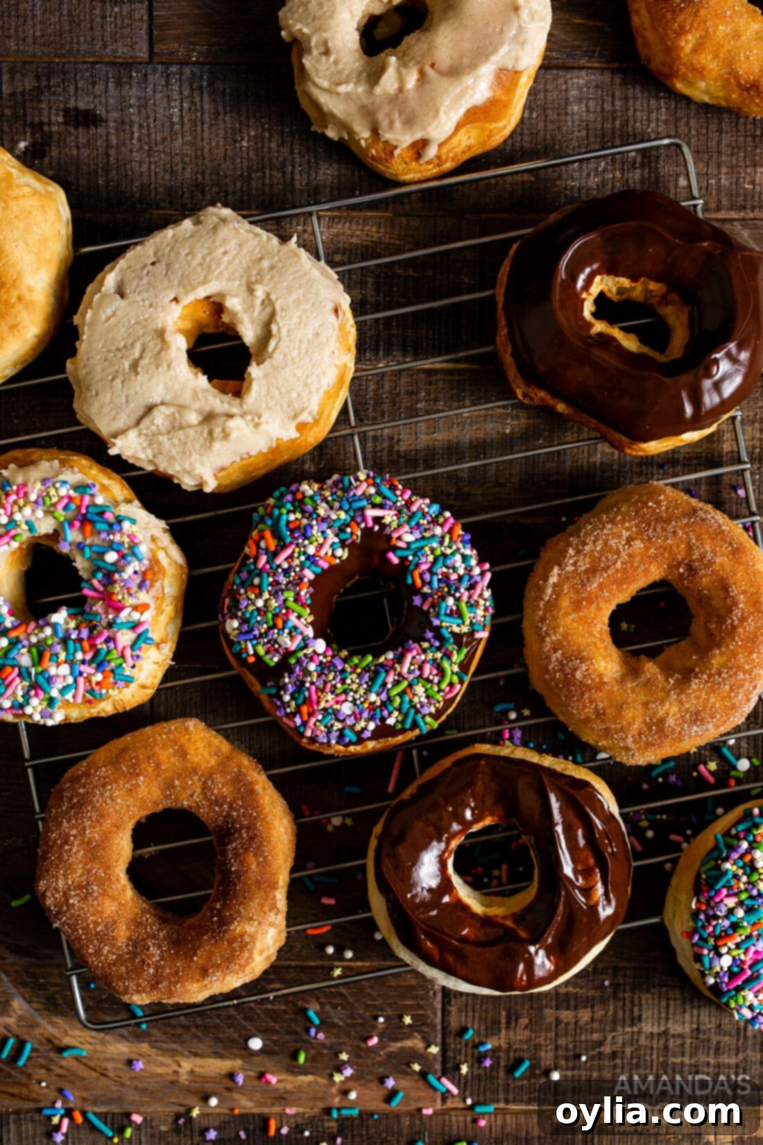 decorated donuts on a wire rack