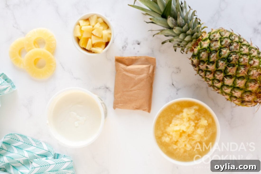 Tropical Yogurt Delight 4 ingredients for pineapple yogurt dessert: Greek yogurt, instant vanilla pudding mix, crushed pineapple