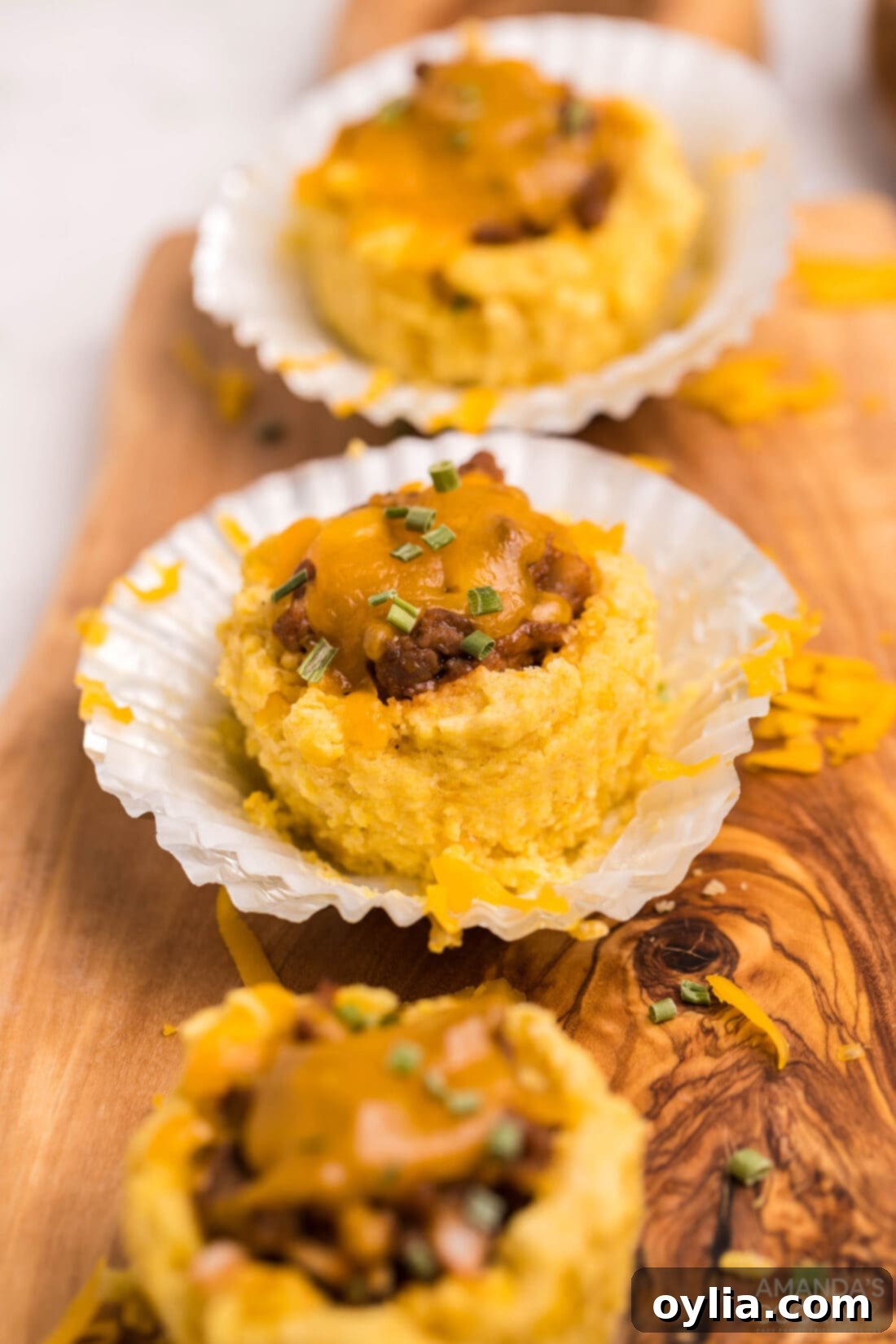 Sloppy Joe Corn Muffins in paper liners, ready to be served as appetizers or finger food.