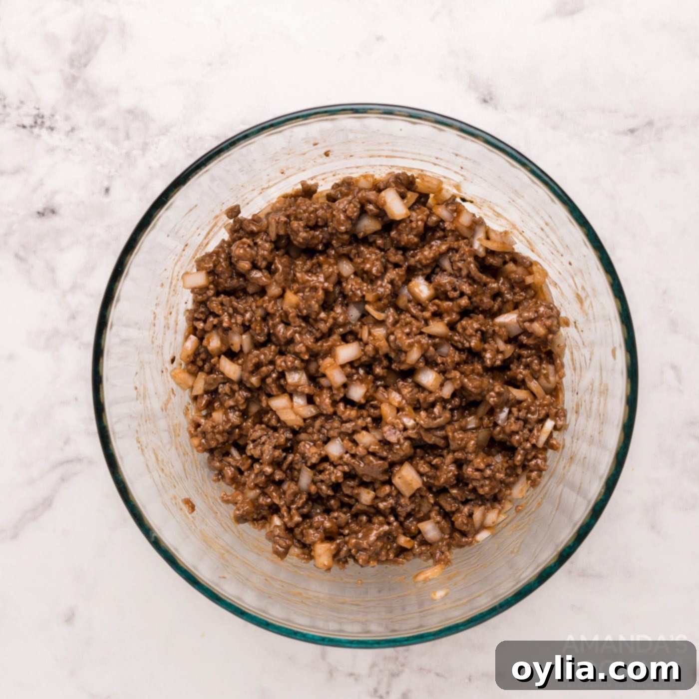 Sloppy joe mixture combined in a bowl, ready to fill the cornbread muffins.