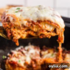 Set It and Forget It Lasagna 13 lifting lasagna from crockpot