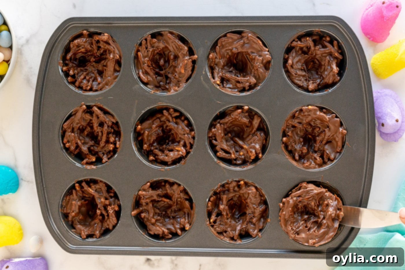 Bird nest cookies shaped in a muffin pan.
