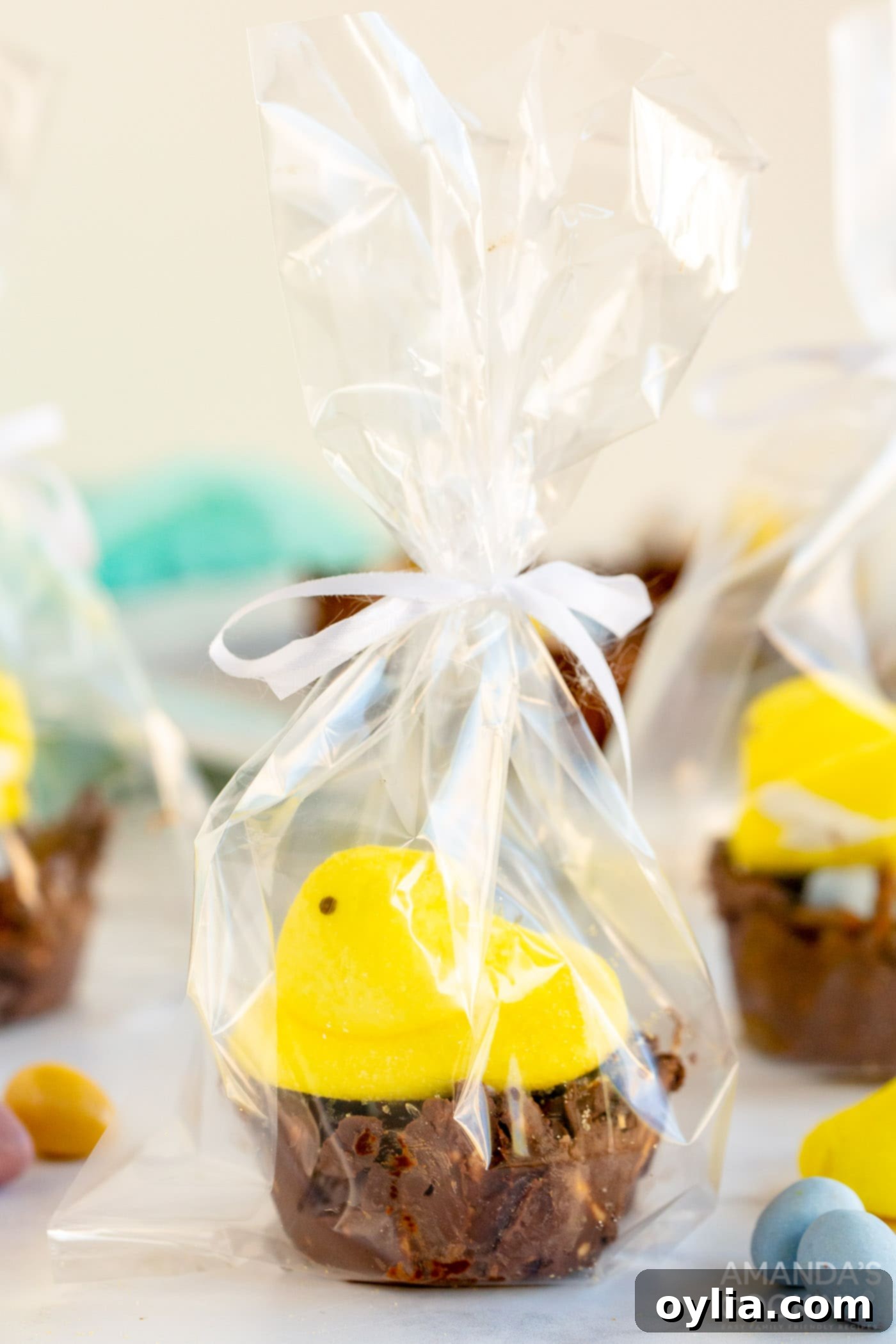 Bird Nest Cookies decorated with candy eggs and a Peep marshmallow