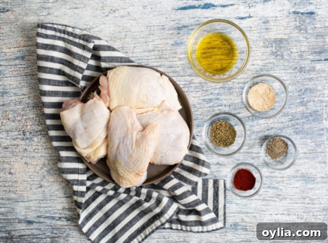 Crispy Air Fryer Chicken Thighs 4 ingredients needed for air fryer chicken thighs: chicken thighs, olive oil, and various spices