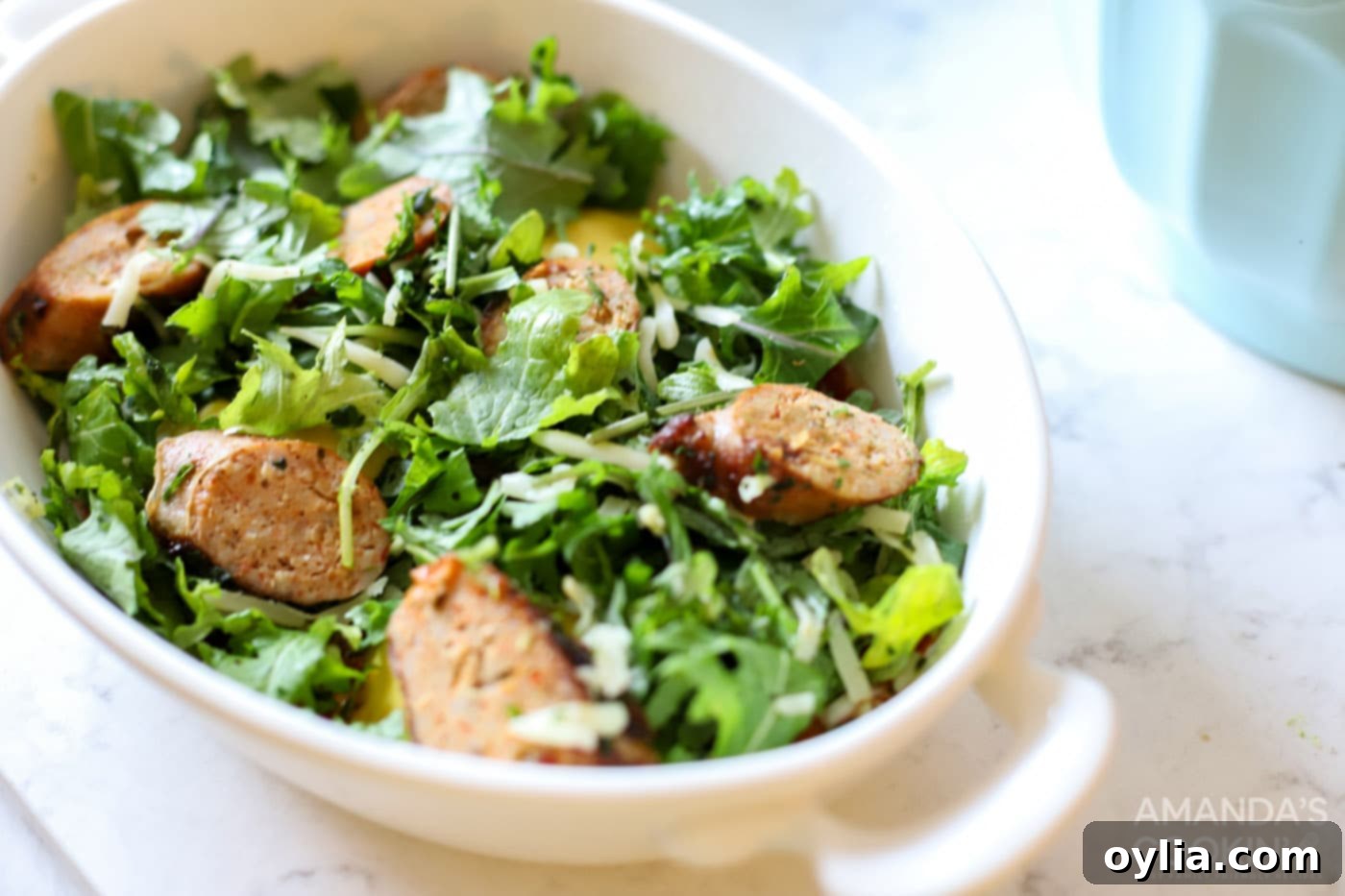 chicken sausage and kale in a casserole dish