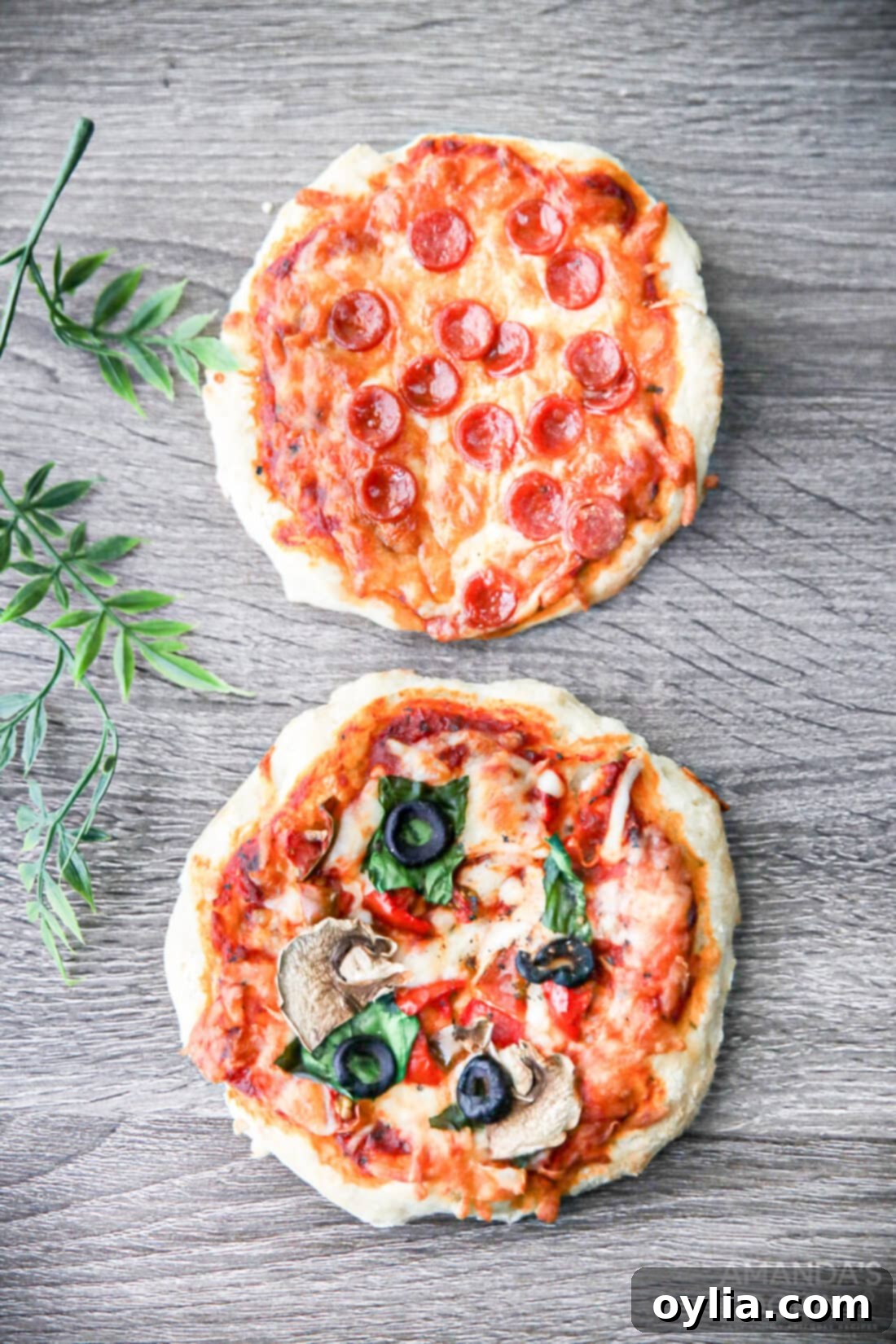 The Perfect Air Fryer Pizza 3 overhead photo of Air Fryer Pizza with various toppings
