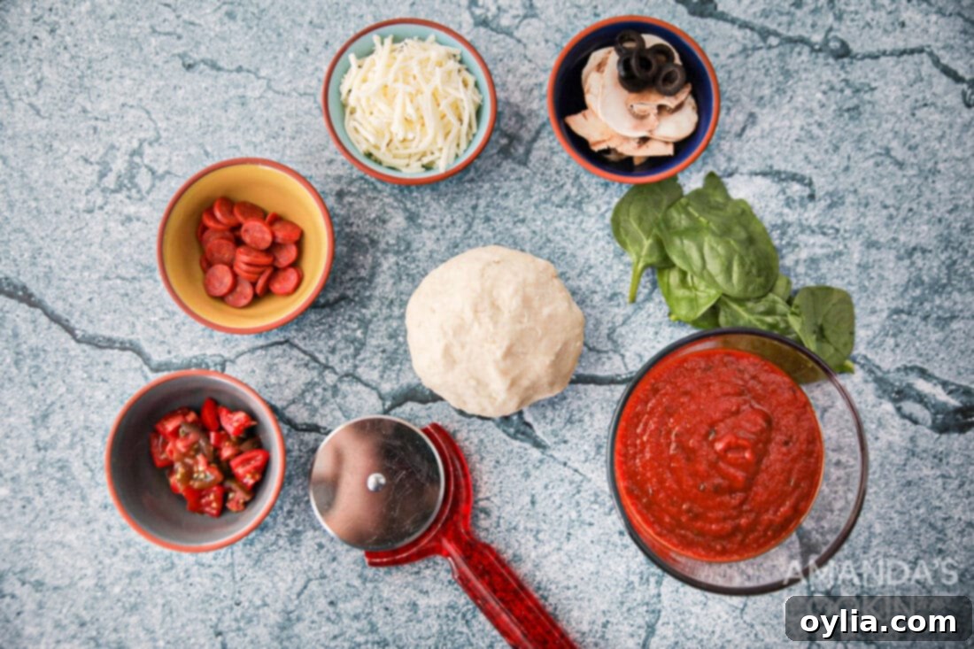 The Perfect Air Fryer Pizza 4 ingredients for Air Fryer Pizza including dough, sauce, cheese, and toppings
