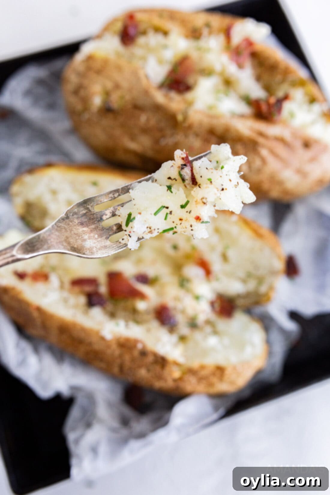 fork full of air fryer baked potato