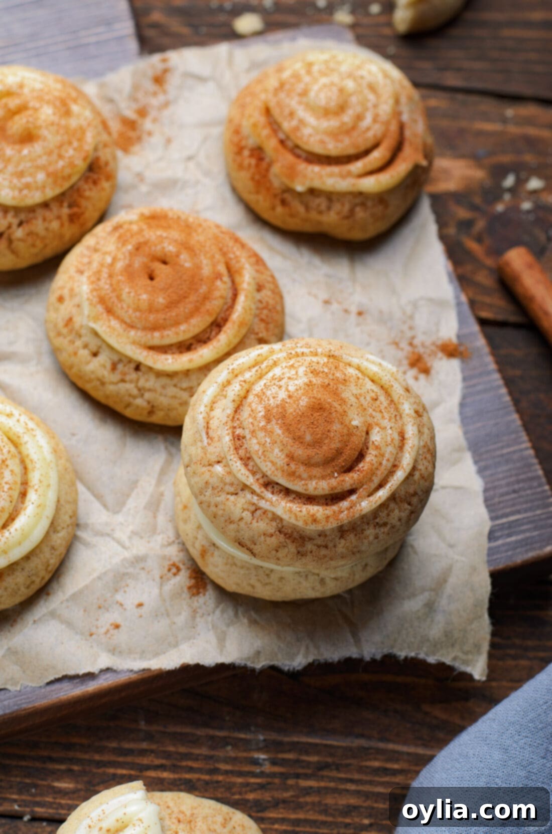 cinnamon roll cookies on parchment