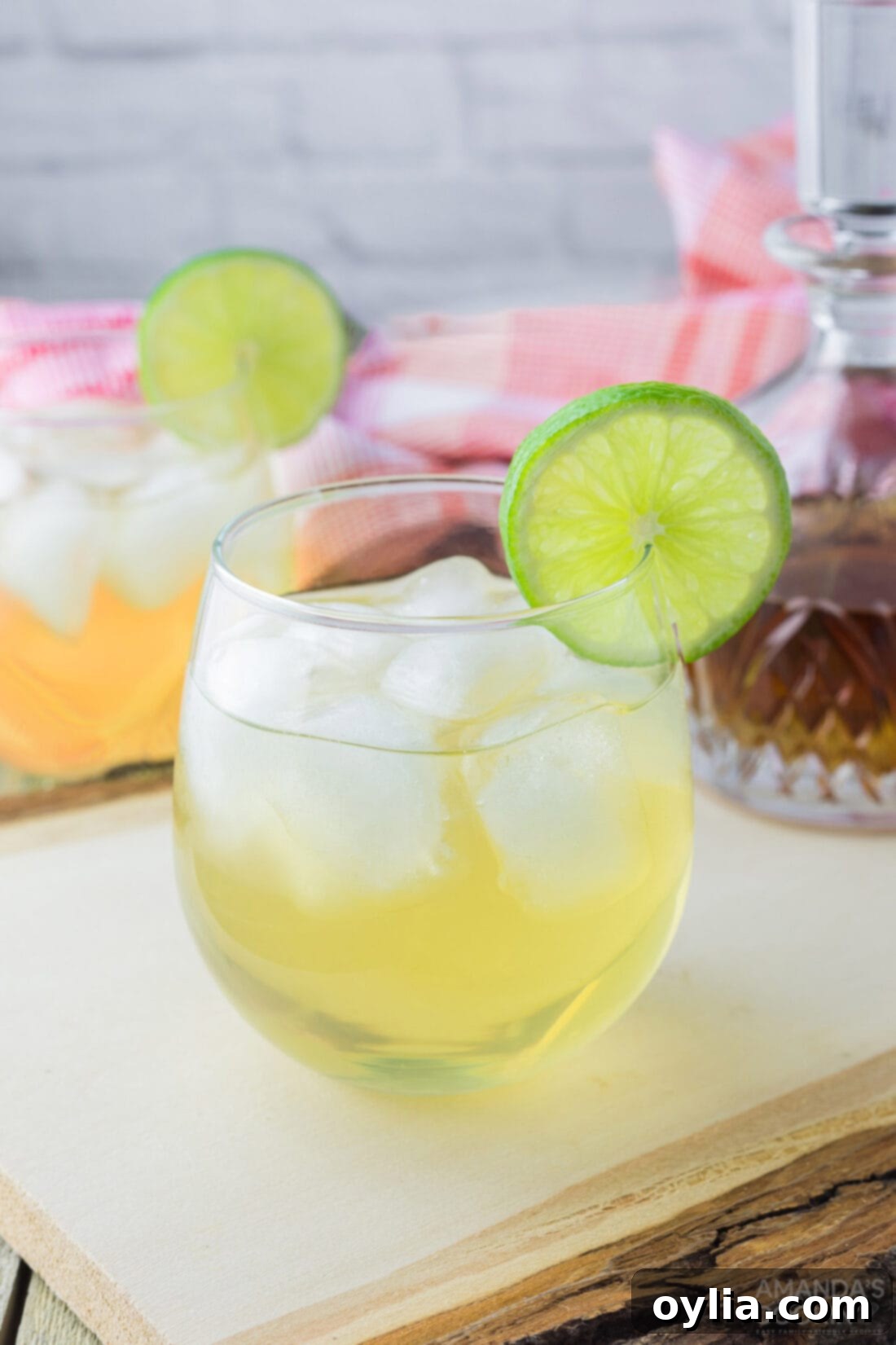 Zesty Spirit 8 Final served glass of Spiked Limeade garnished with a lime slice and mint