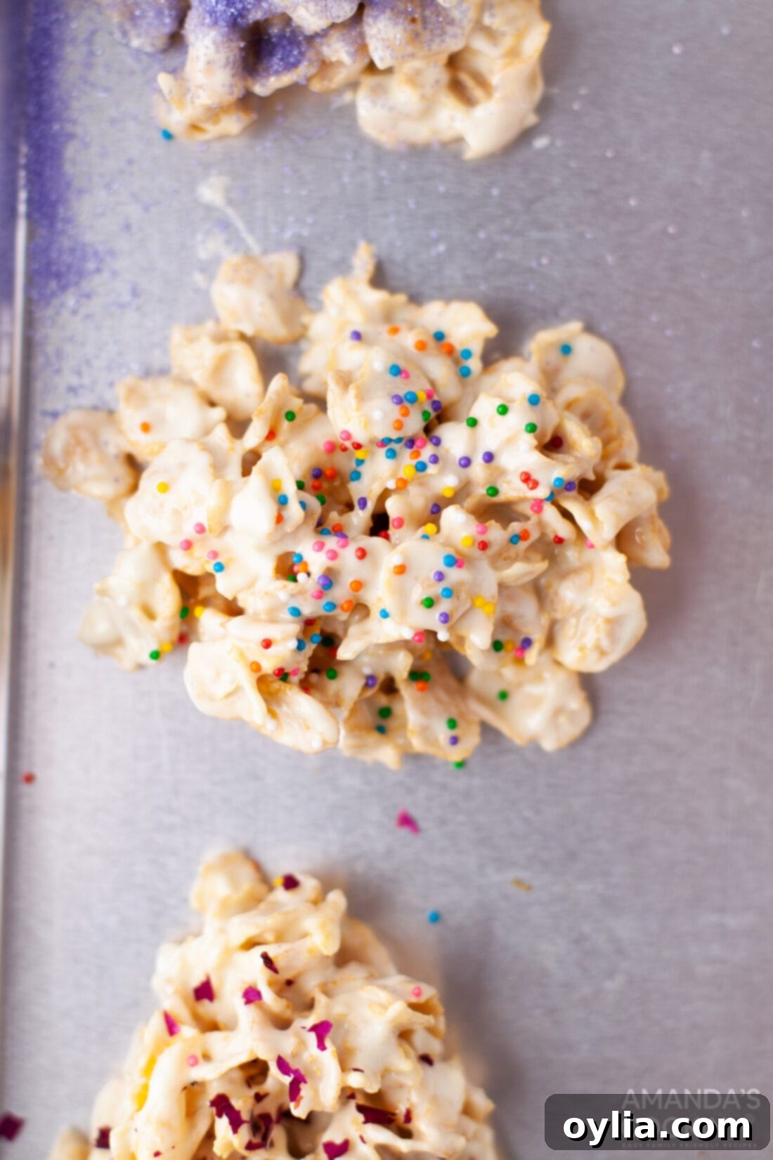 An elegant white chocolate no-bake cornflake cookie, artfully placed on a small plate, ready to be enjoyed.