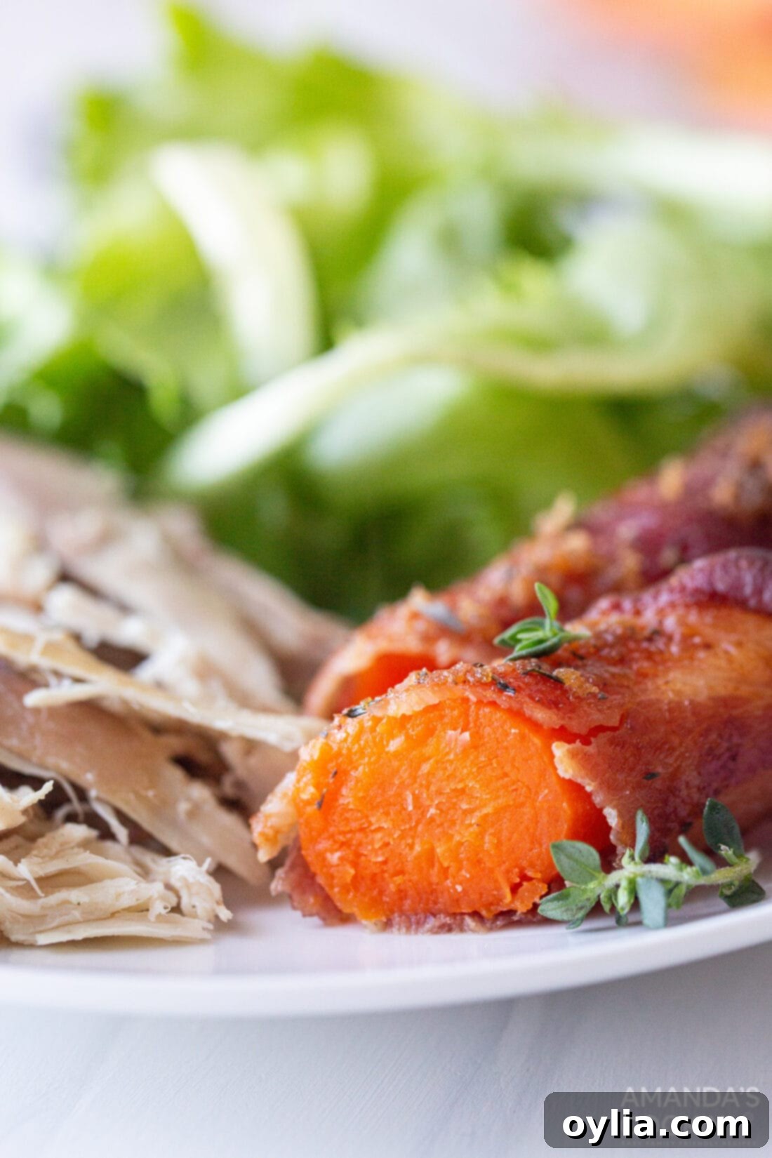 Sweet and Savory Air Fryer Bacon Wrapped Carrots 10 sliced carrot on plate
