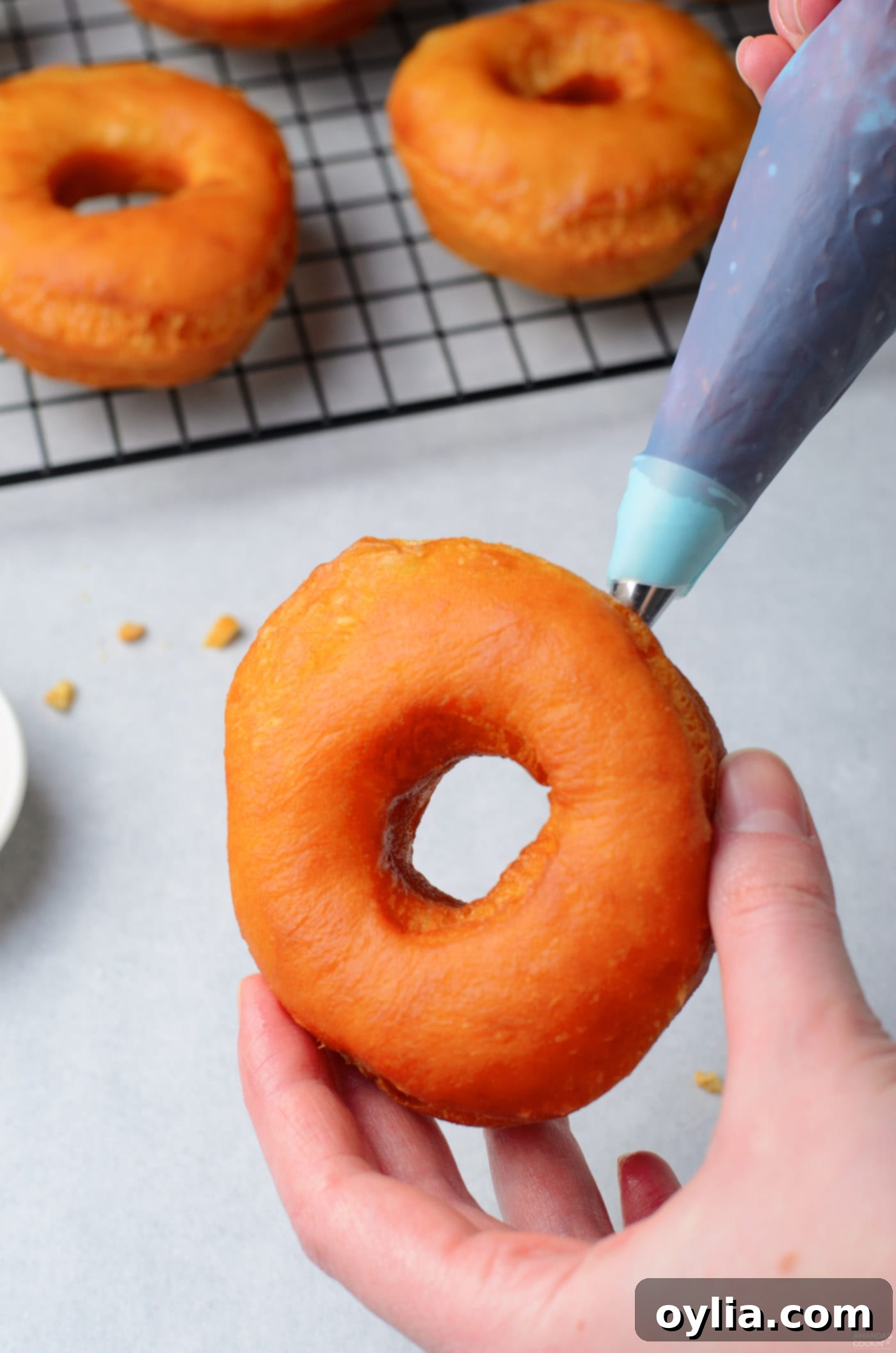 filling donuts with jelly