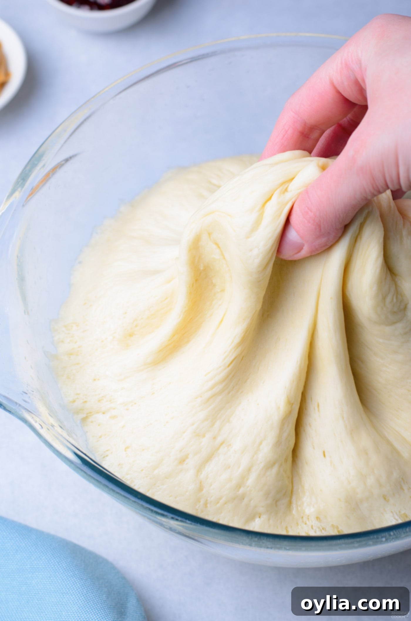 pinching donut dough
