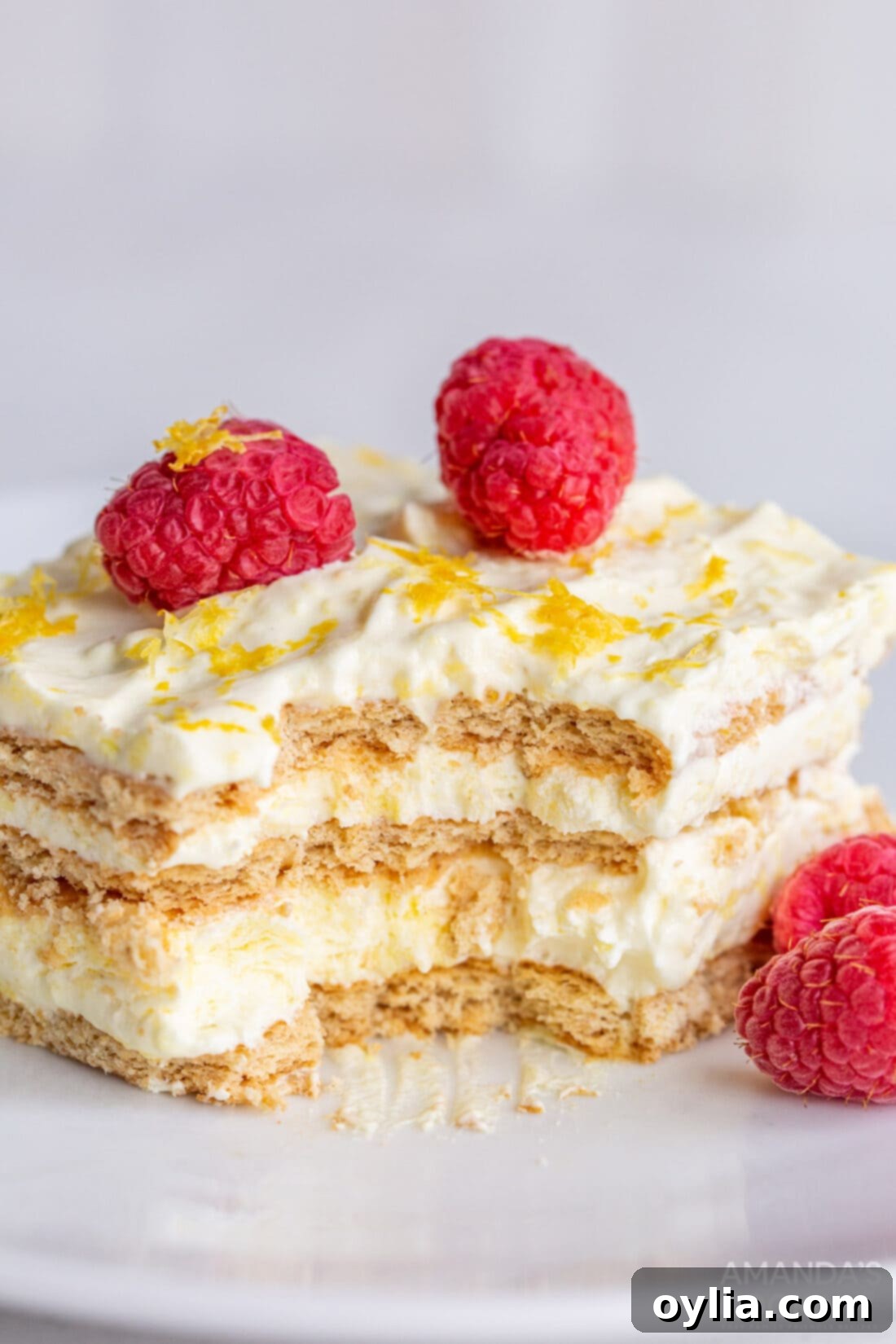 Lemon Icebox Cake 3 lemon icebox cake with bites out of it