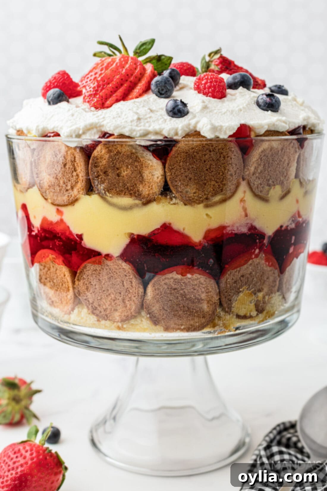 trifle made with jello with vibrant layers of fruit and cream