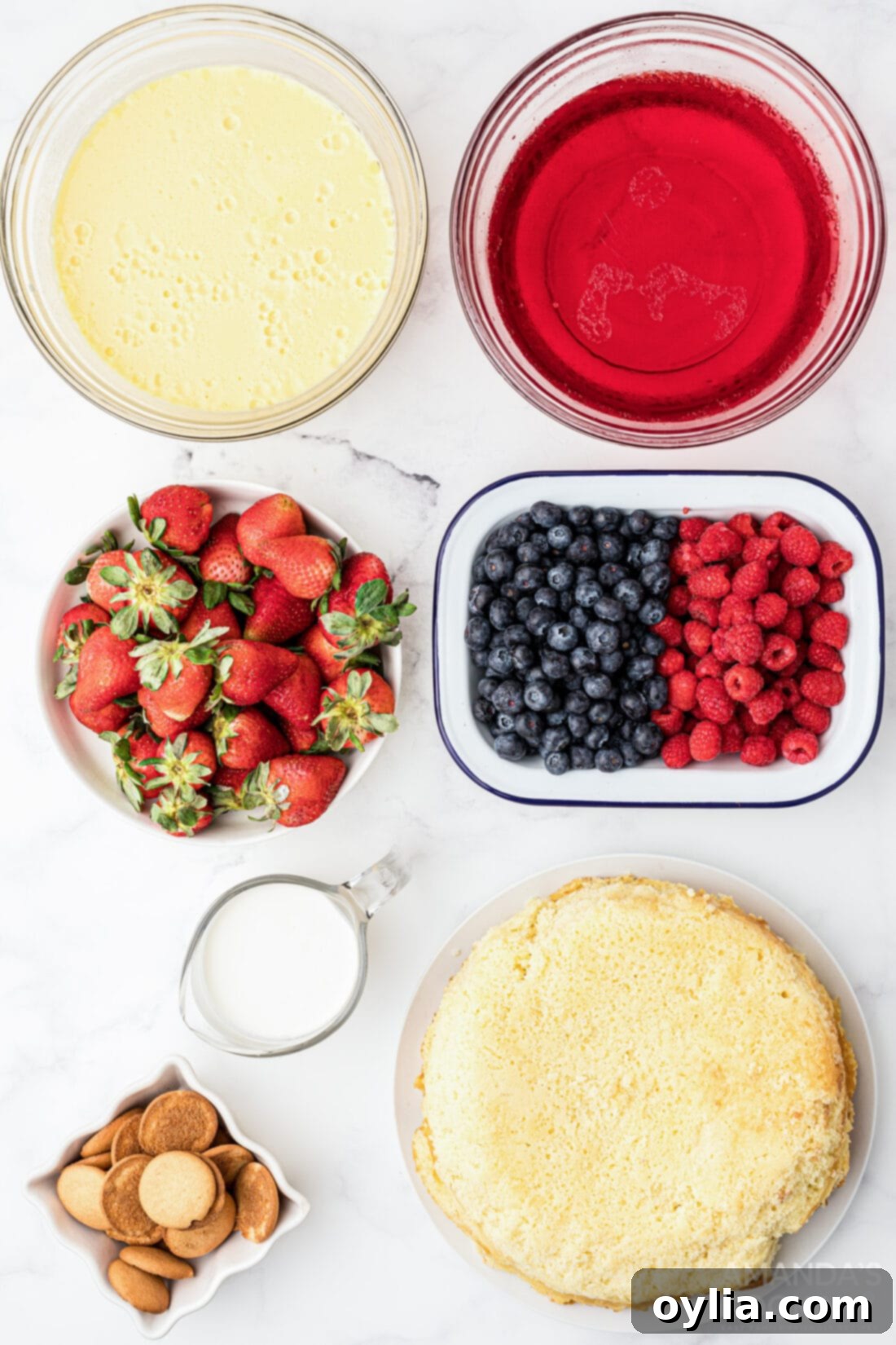 Vibrant Gelatin Parfait 4 ingredients for jello trifle laid out on a table