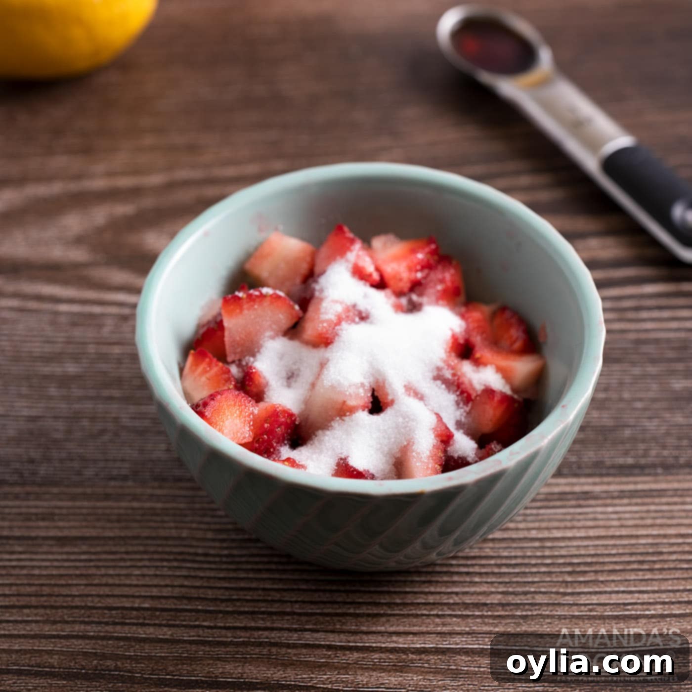 chopped strawberries with sugar in a bowl