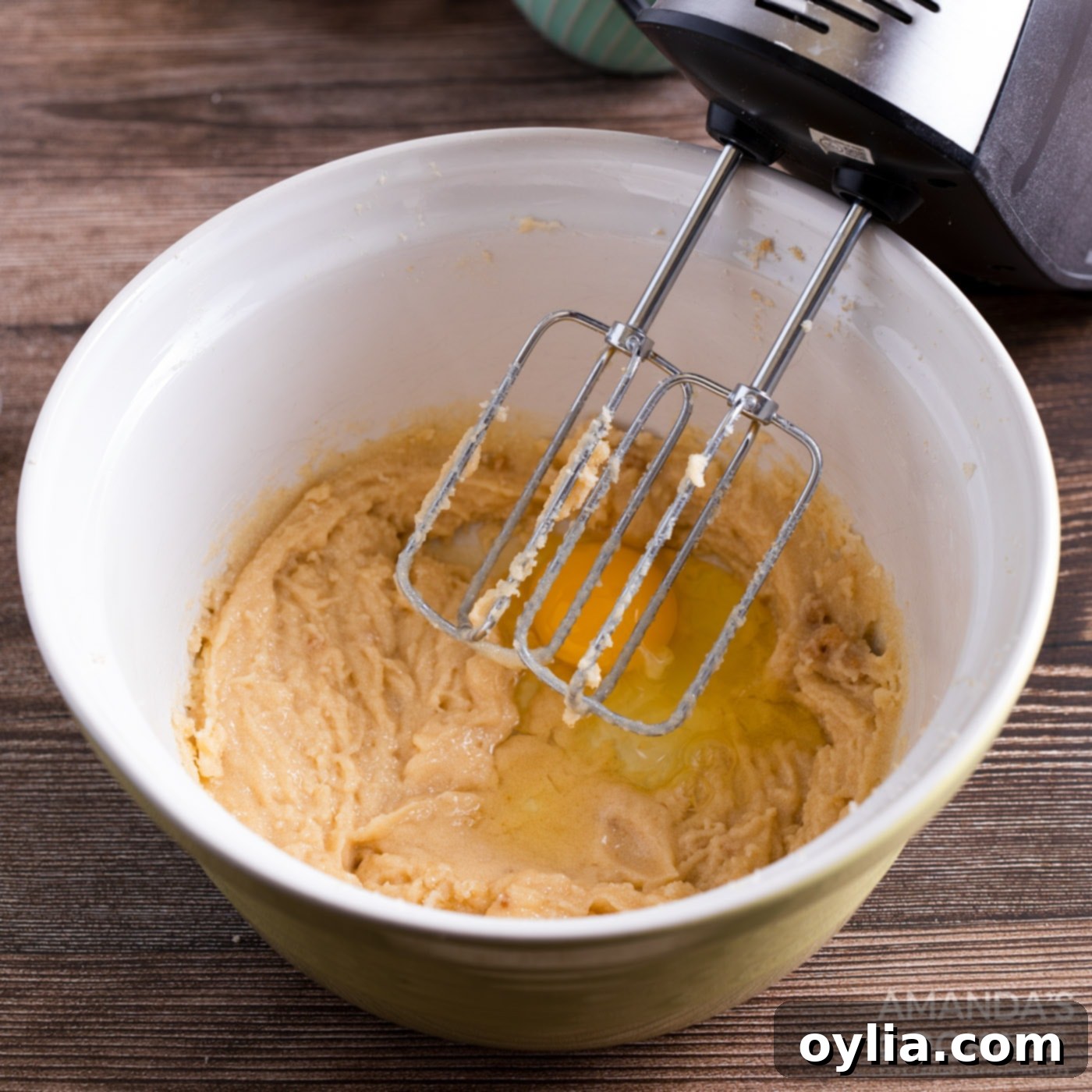 butter, brown sugar, and granulated sugar in a mixing bowl with beater attachment
