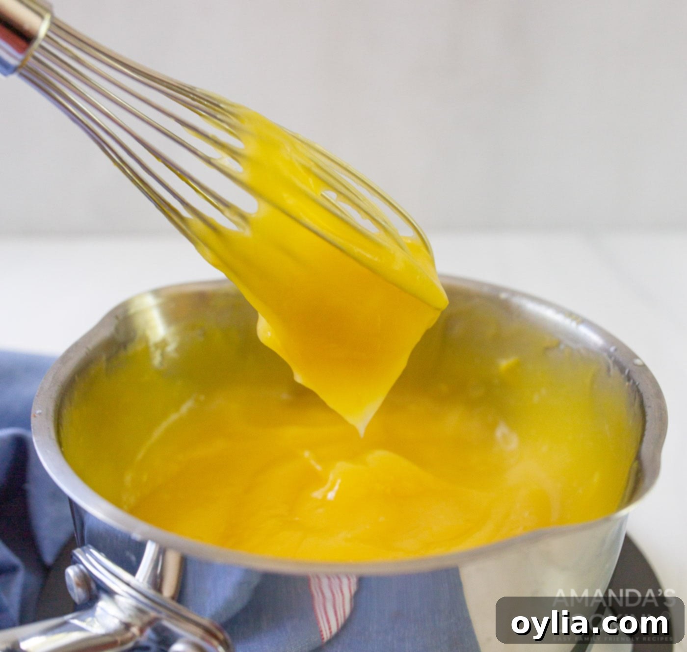 lemon custard on a whisk