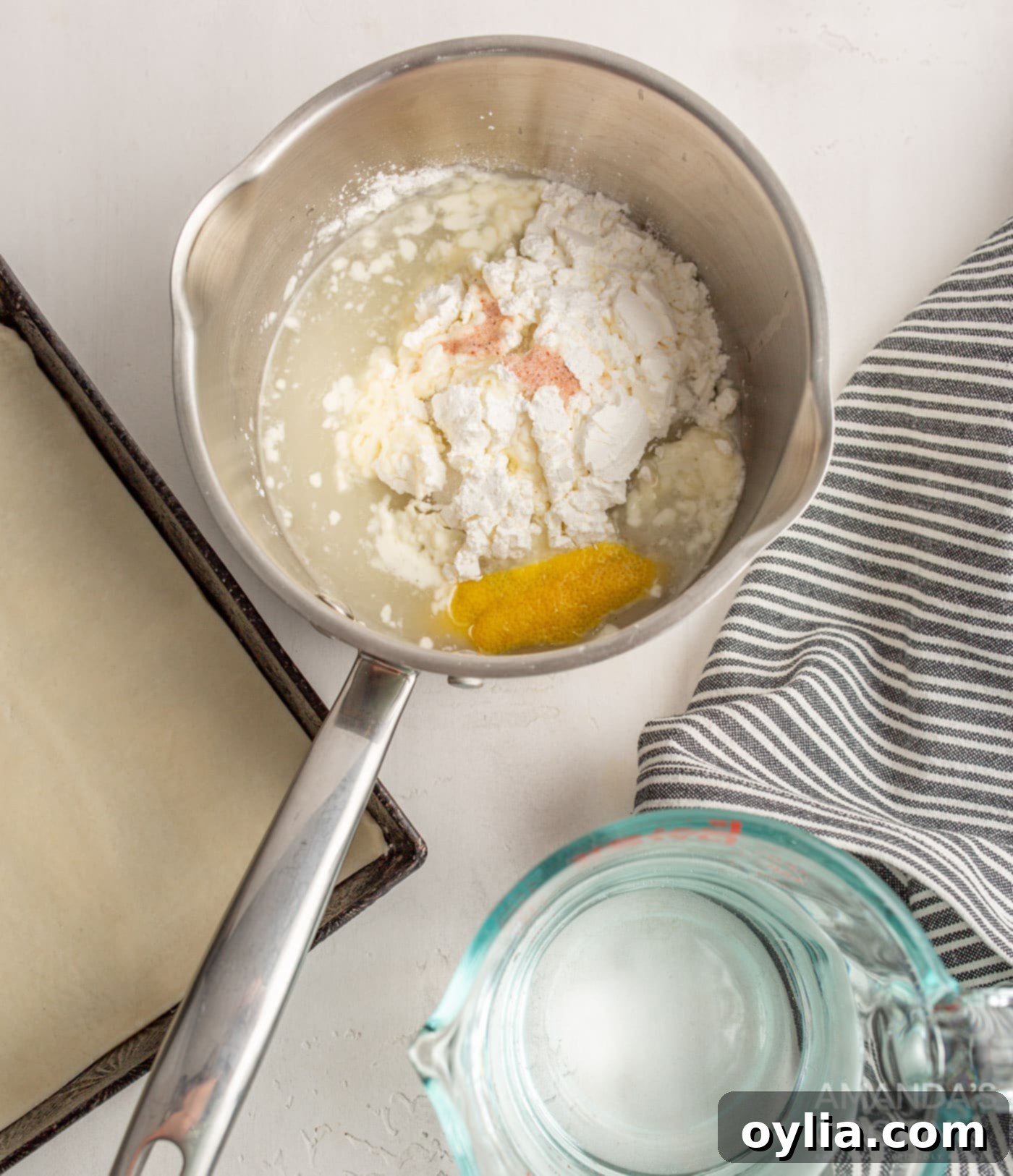 lemon curd ingredients in a saucepan