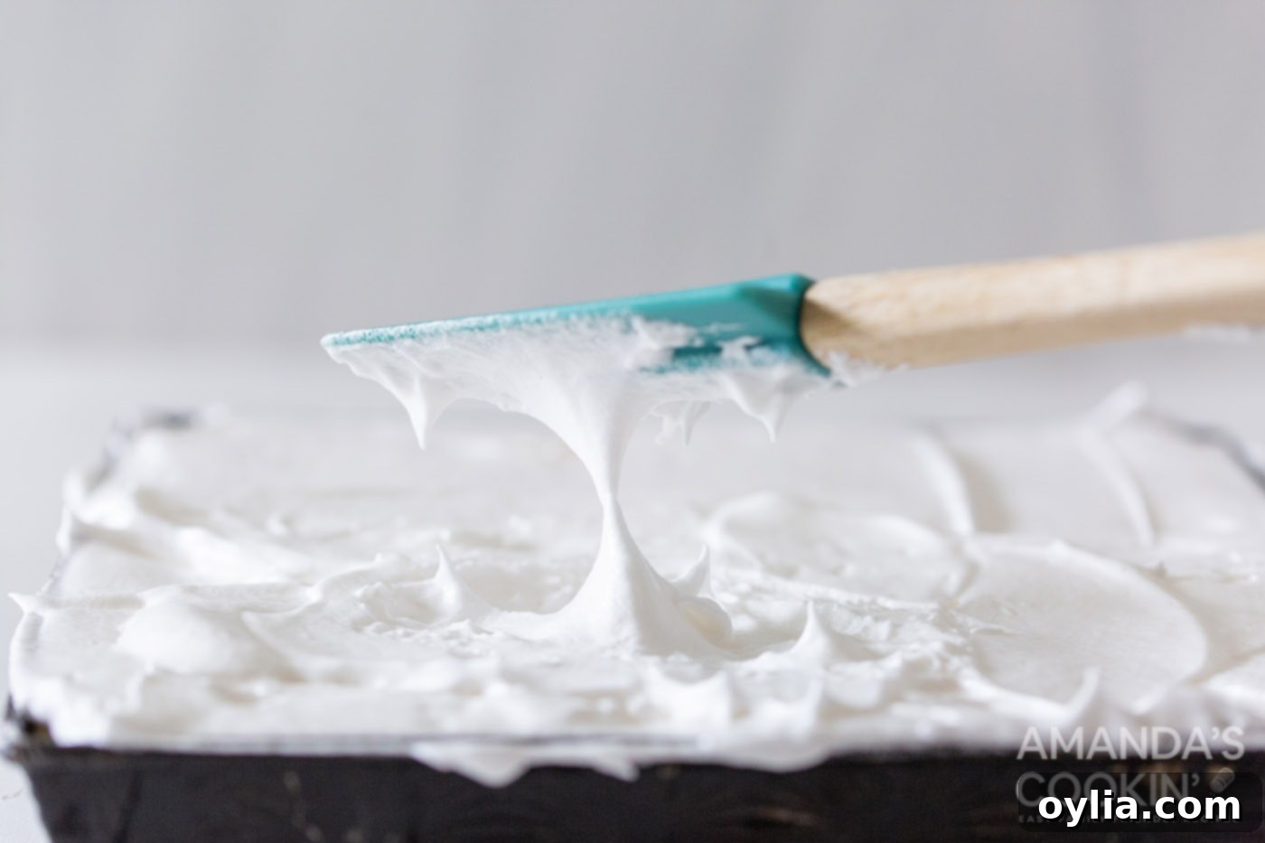 rubber spatula making lemon meringue peaks