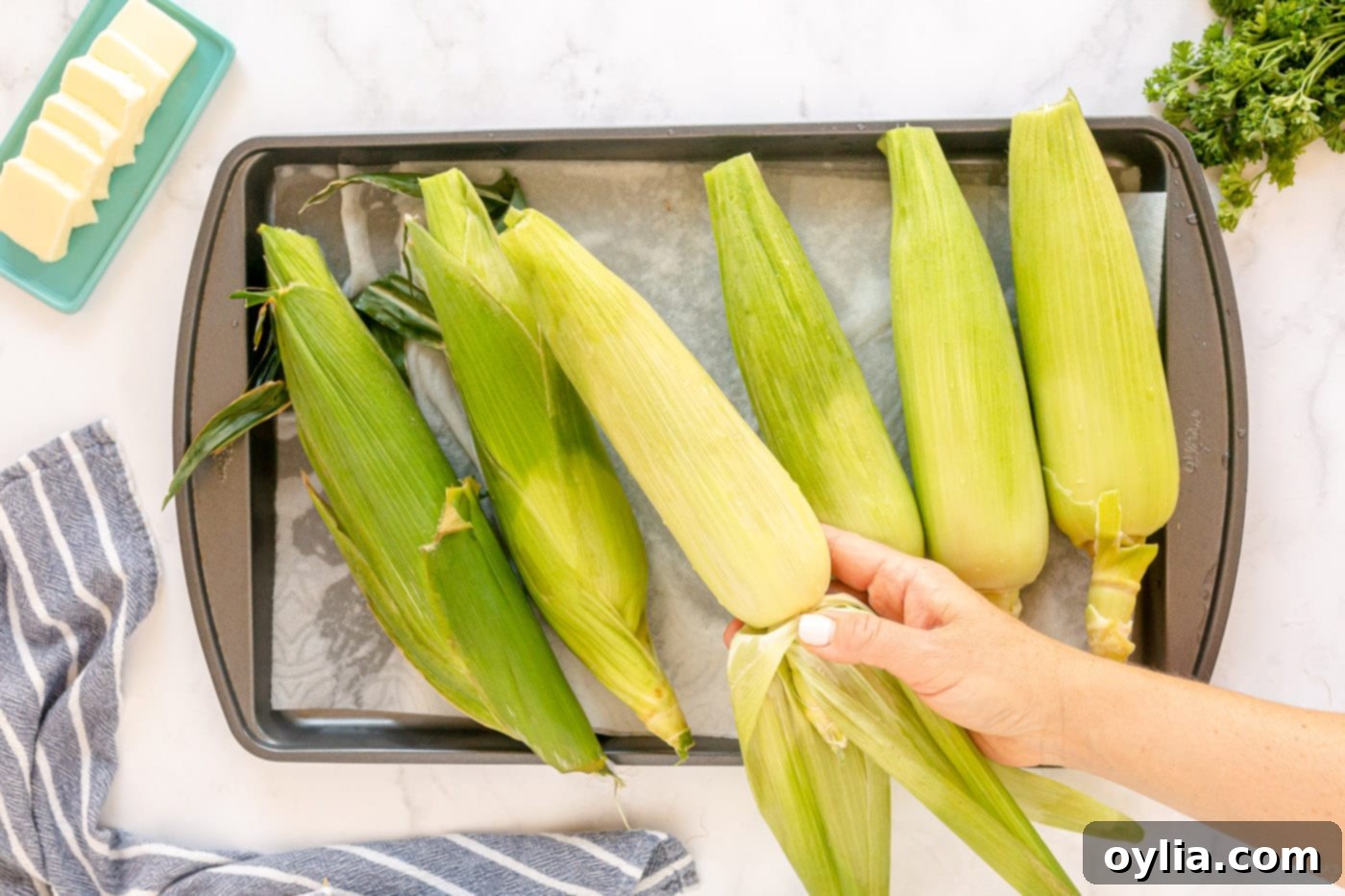 removing outer husks from corn