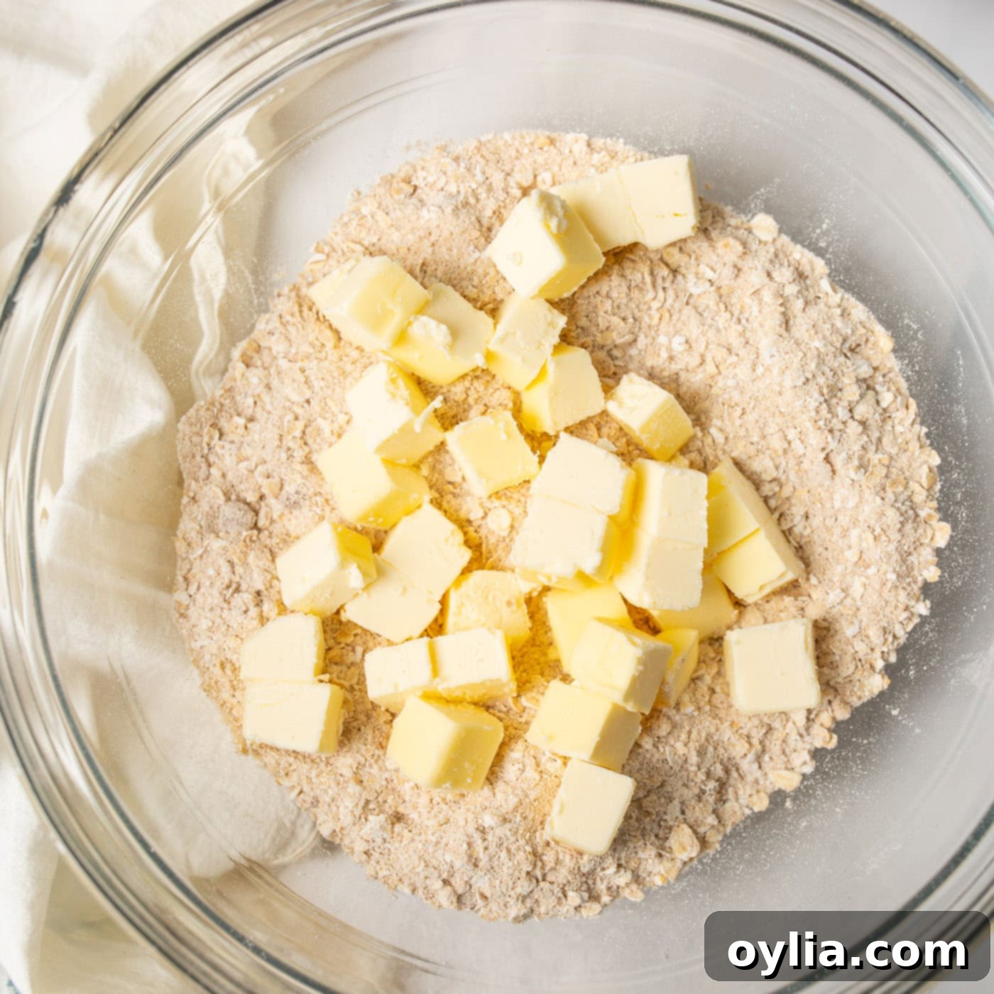 Flour mixture and butter cubes in a bowl