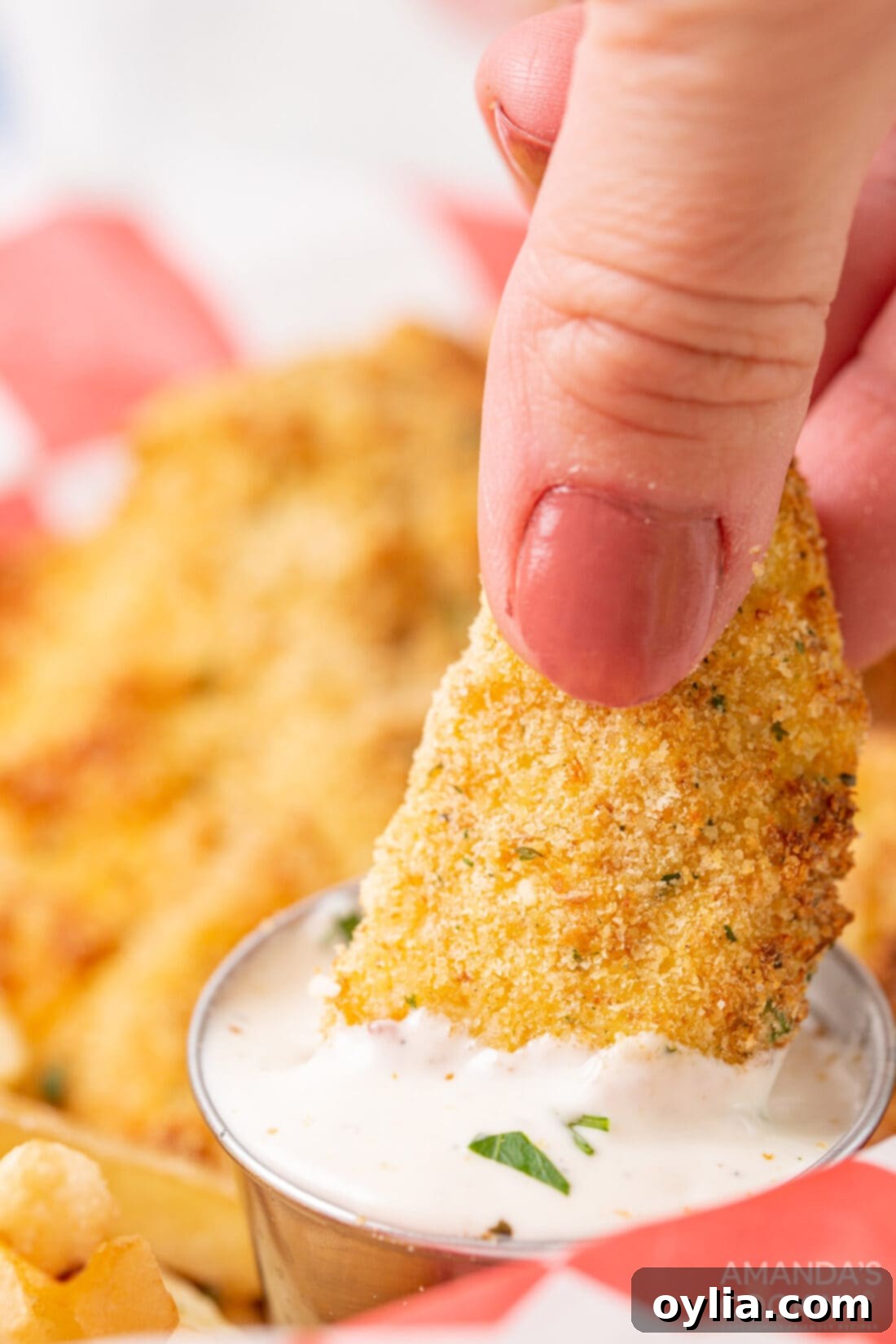 Quick and Crispy Air Fryer Chicken Tenders 8 dipping chicken tender in ranch