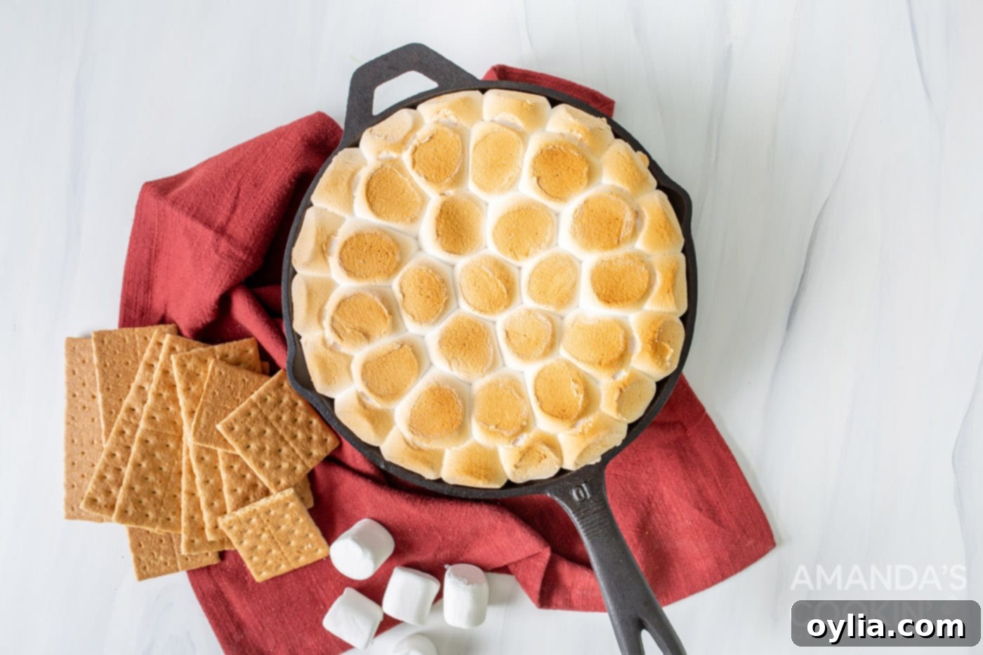 smores dip in a cast iron skillet overhead shot